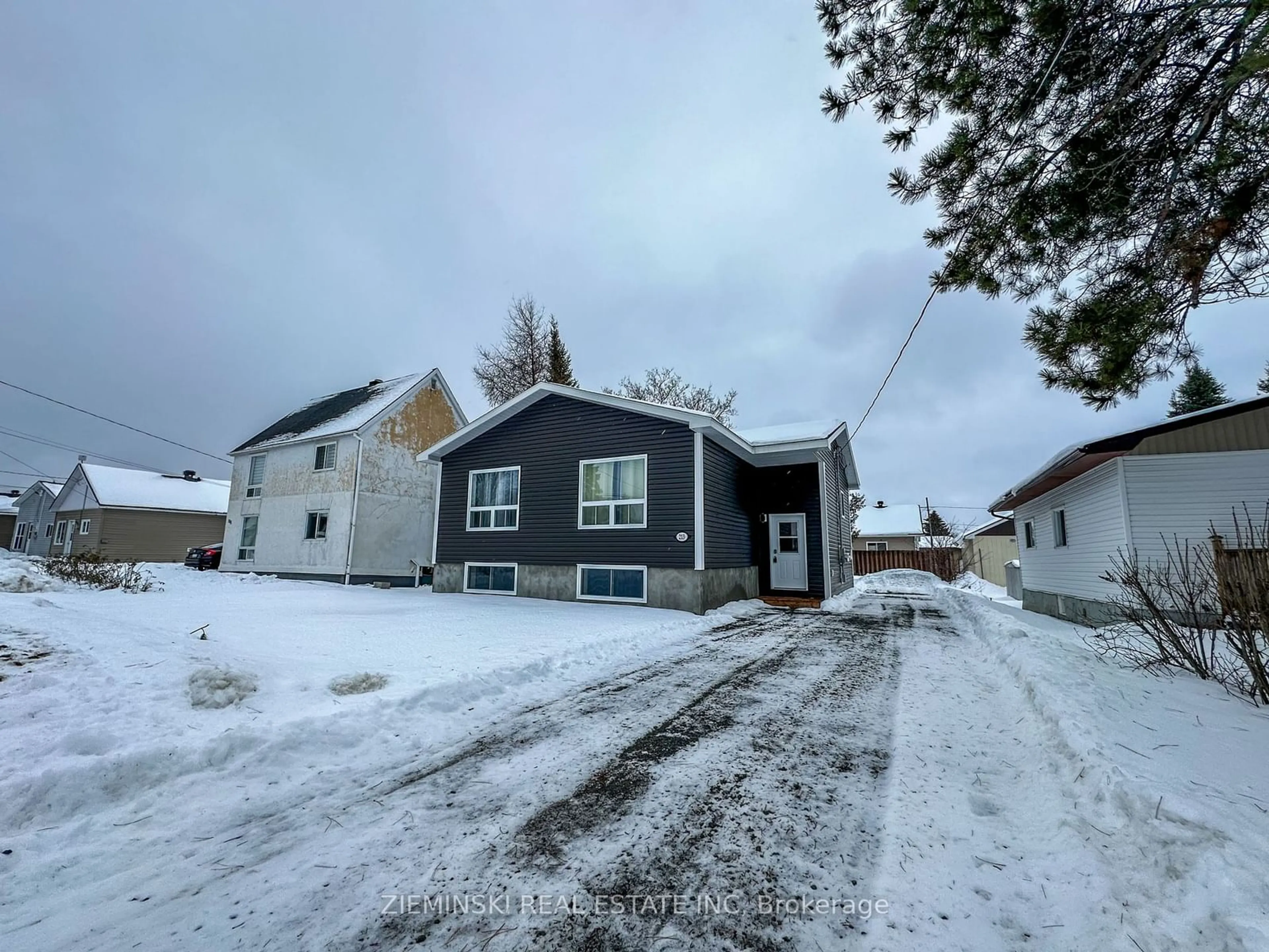 A pic from outside/outdoor area/front of a property/back of a property/a pic from drone, street for 213 Teefy St, Iroquois Falls Ontario P0K 1G0