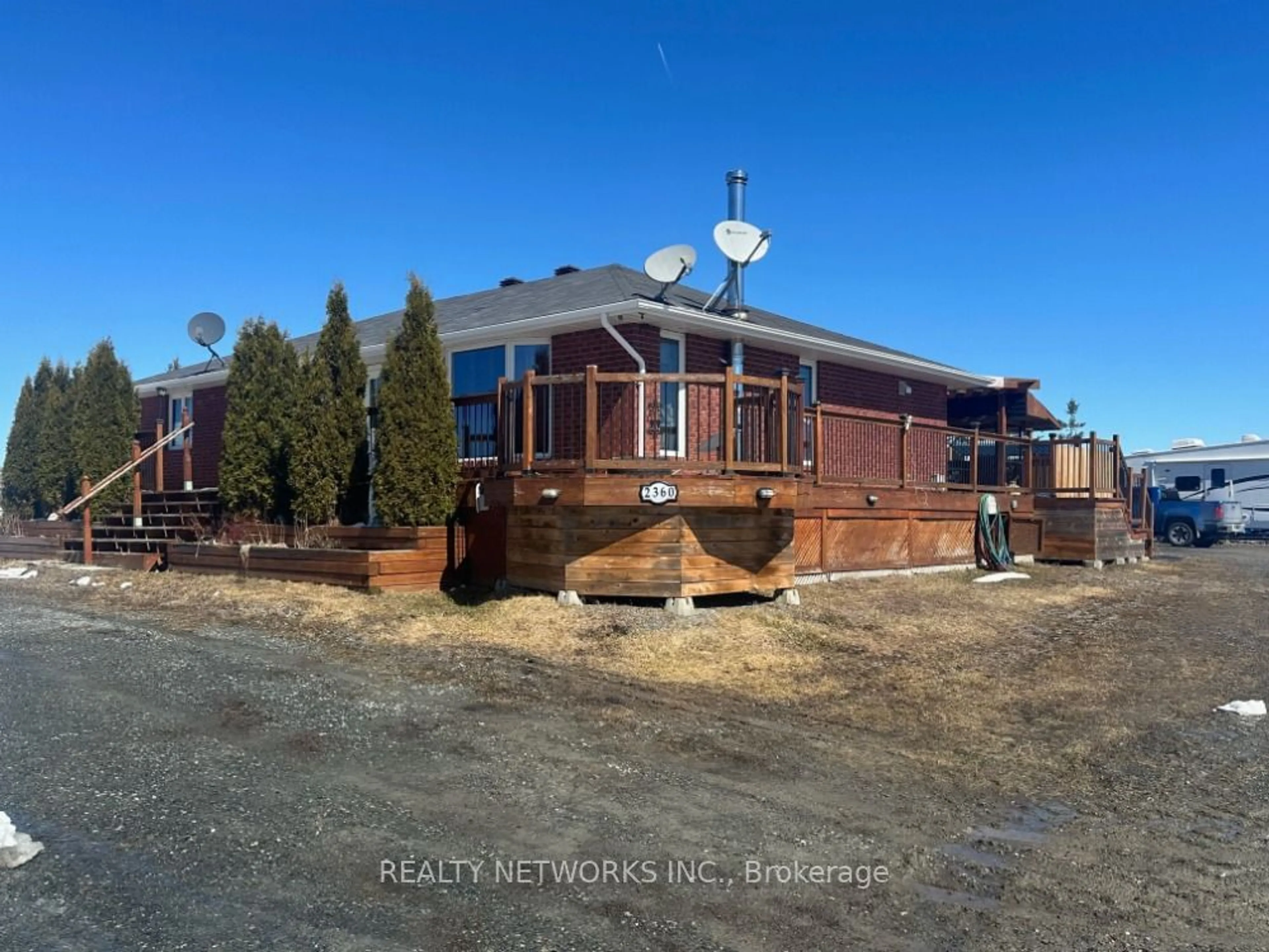 A pic from outside/outdoor area/front of a property/back of a property/a pic from drone, building for 2360 Jaguar Dr, Timmins Ontario P4N 7C3