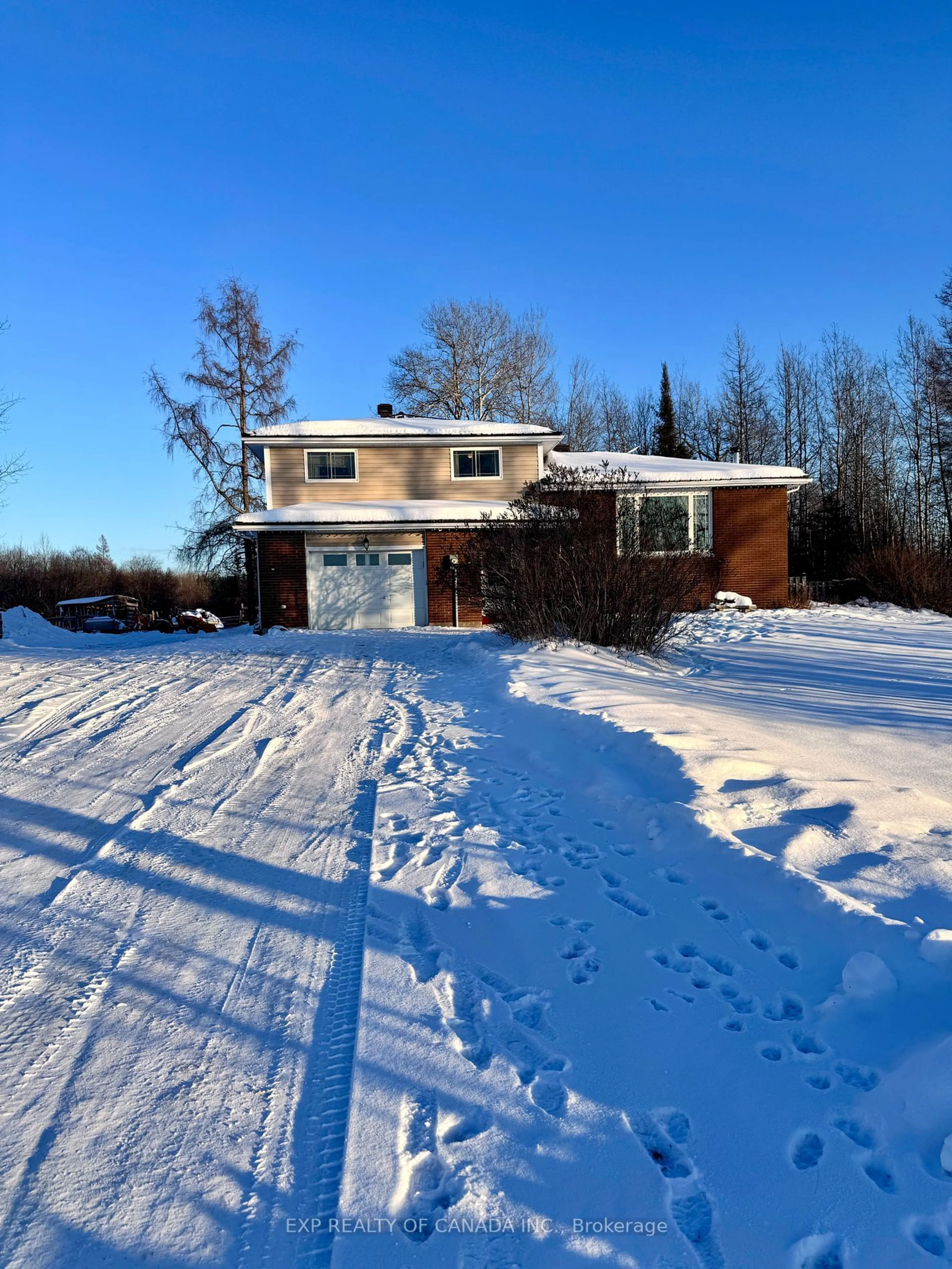 A pic from outside/outdoor area/front of a property/back of a property/a pic from drone, unknown for 434 Carrigan Rd, Timmins Ontario P0N 1A0