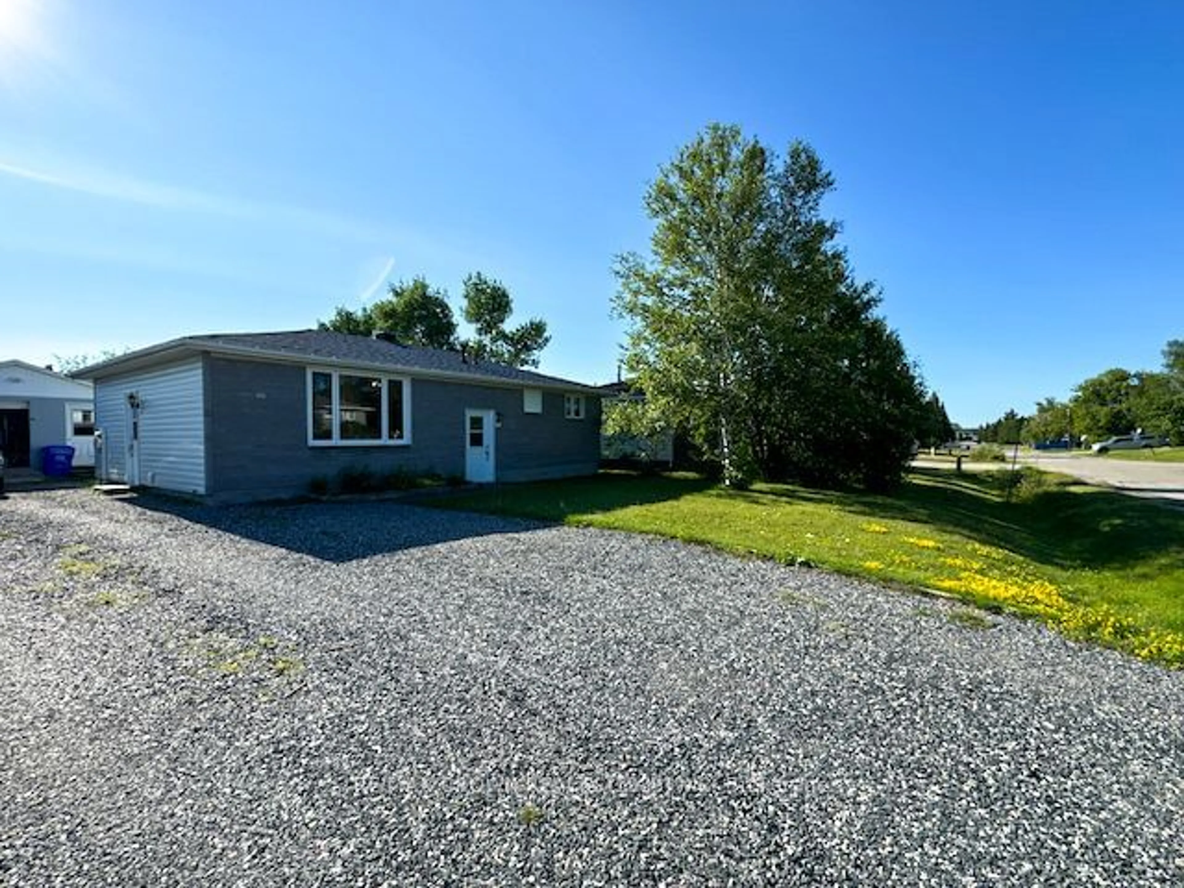 A pic from outside/outdoor area/front of a property/back of a property/a pic from drone, unknown for 39 Houle St, Hearst Ontario P0L 1N0