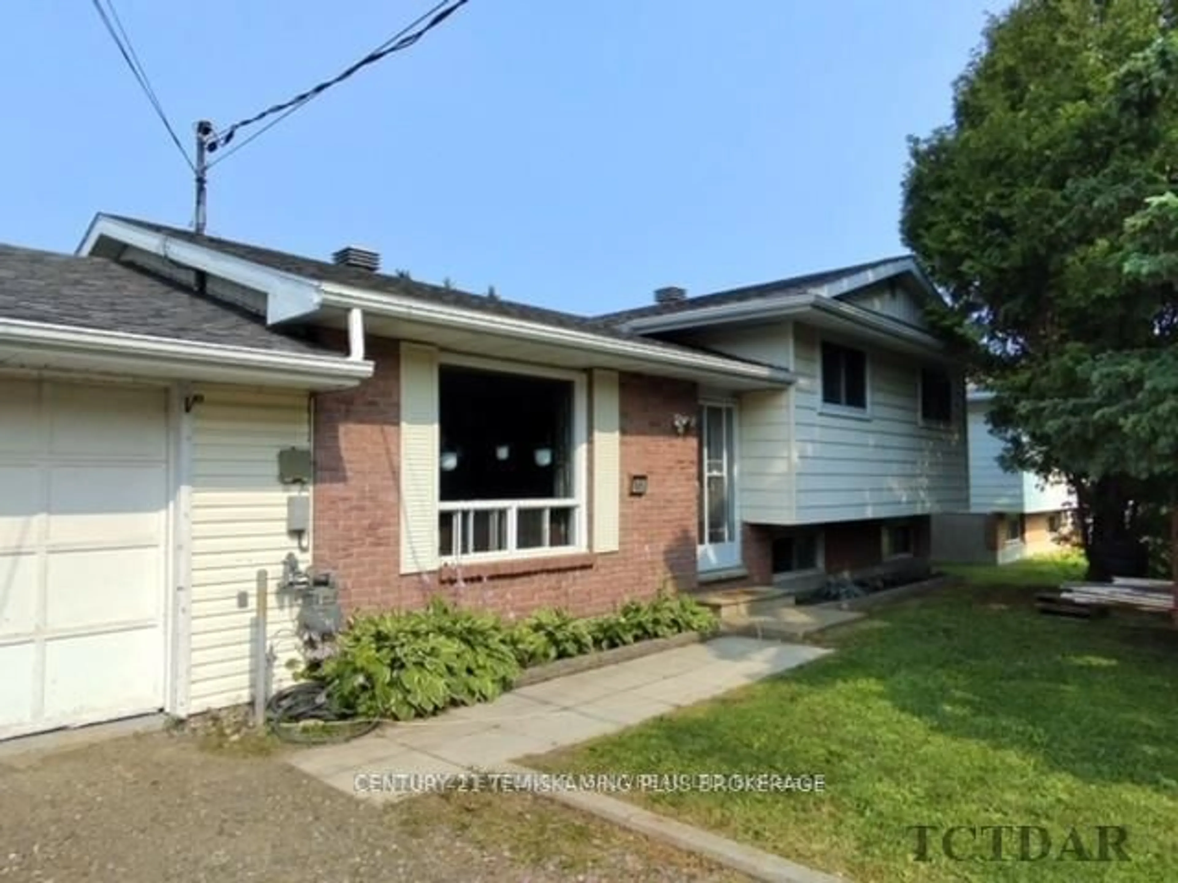 Home with brick exterior material, street for 165 Carter Blvd, Temiskaming Shores Ontario P0J 1R0