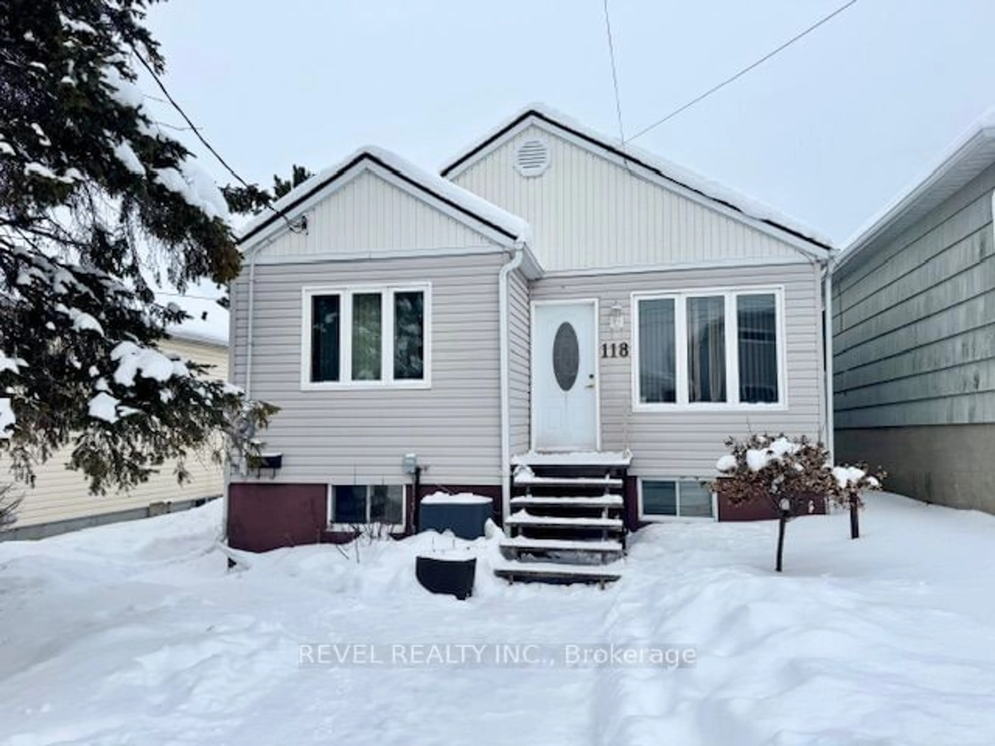 Home with vinyl exterior material, street for 118 Carlin Ave, Timmins Ontario P4N 4K9