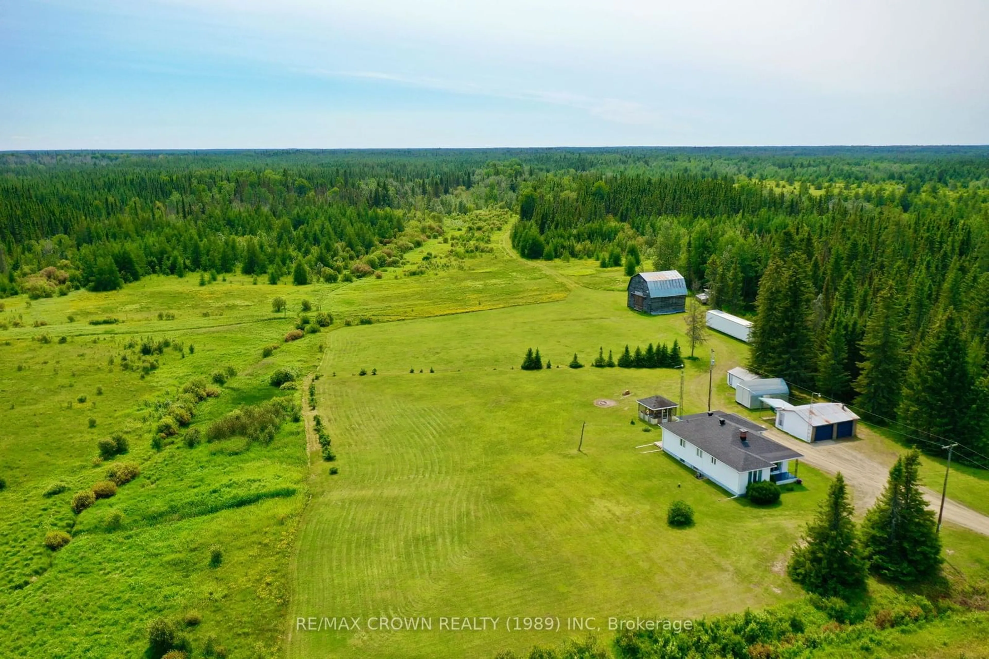 A pic from outside/outdoor area/front of a property/back of a property/a pic from drone, forest/trees view for 298 Highway 11, Fauquier-Strickland Ontario P0L 1G0