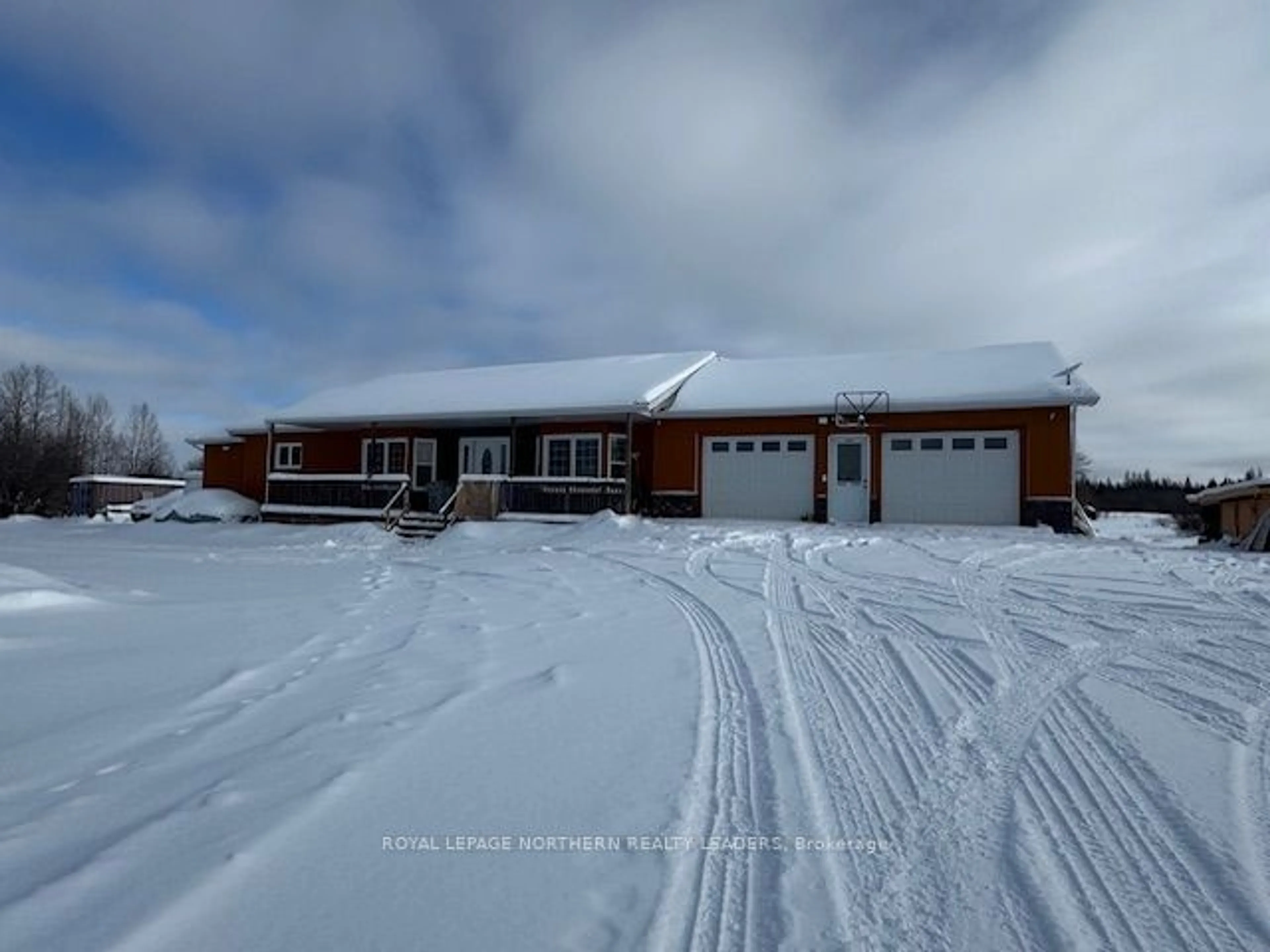 A pic from outside/outdoor area/front of a property/back of a property/a pic from drone, street for 460 Dorans Rd, Timmins Ontario P4P 7C7