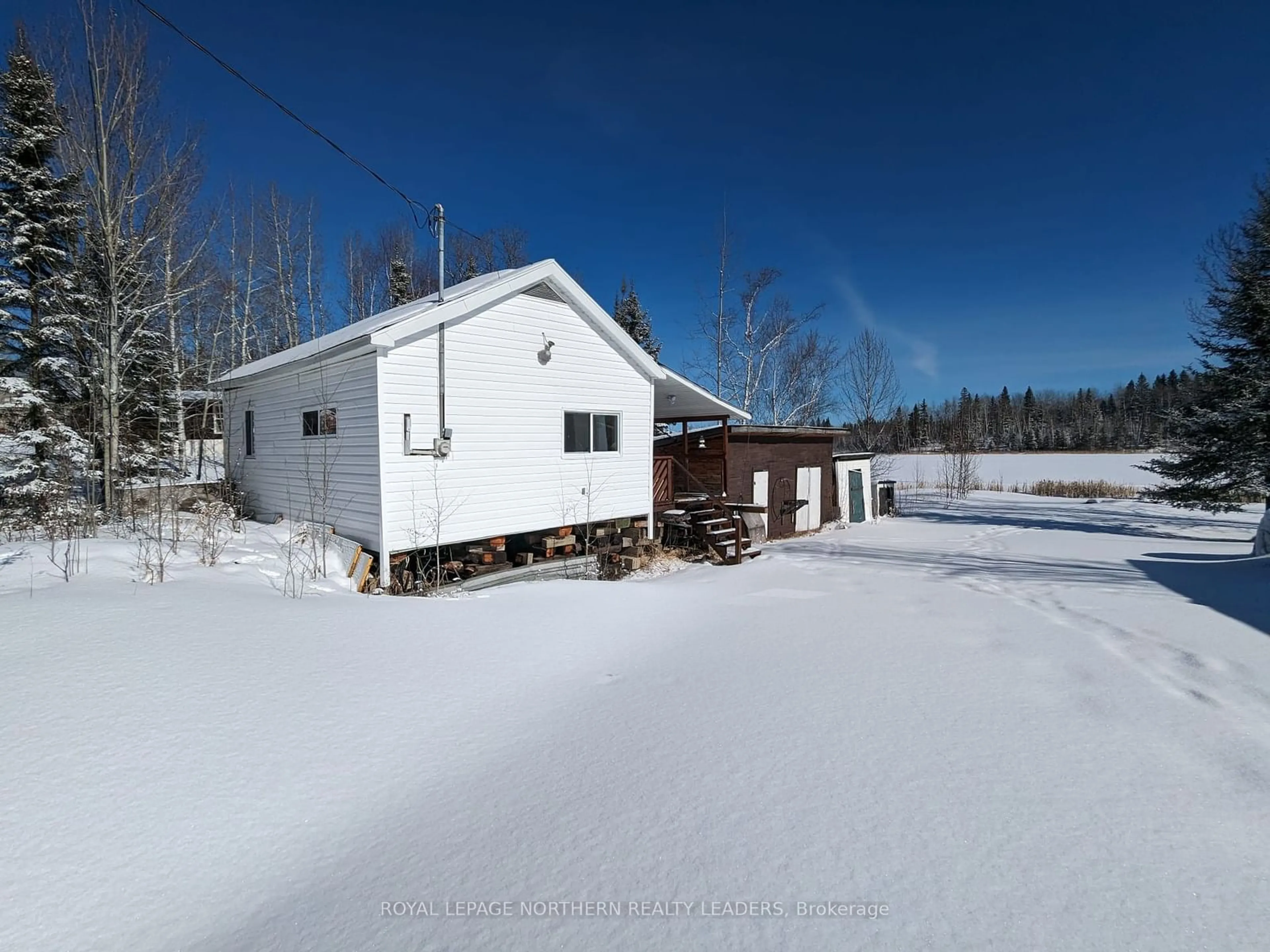 A pic from outside/outdoor area/front of a property/back of a property/a pic from drone, unknown for 793 Lavoie Rd, Fauquier-Strickland Ontario P0L 1G0