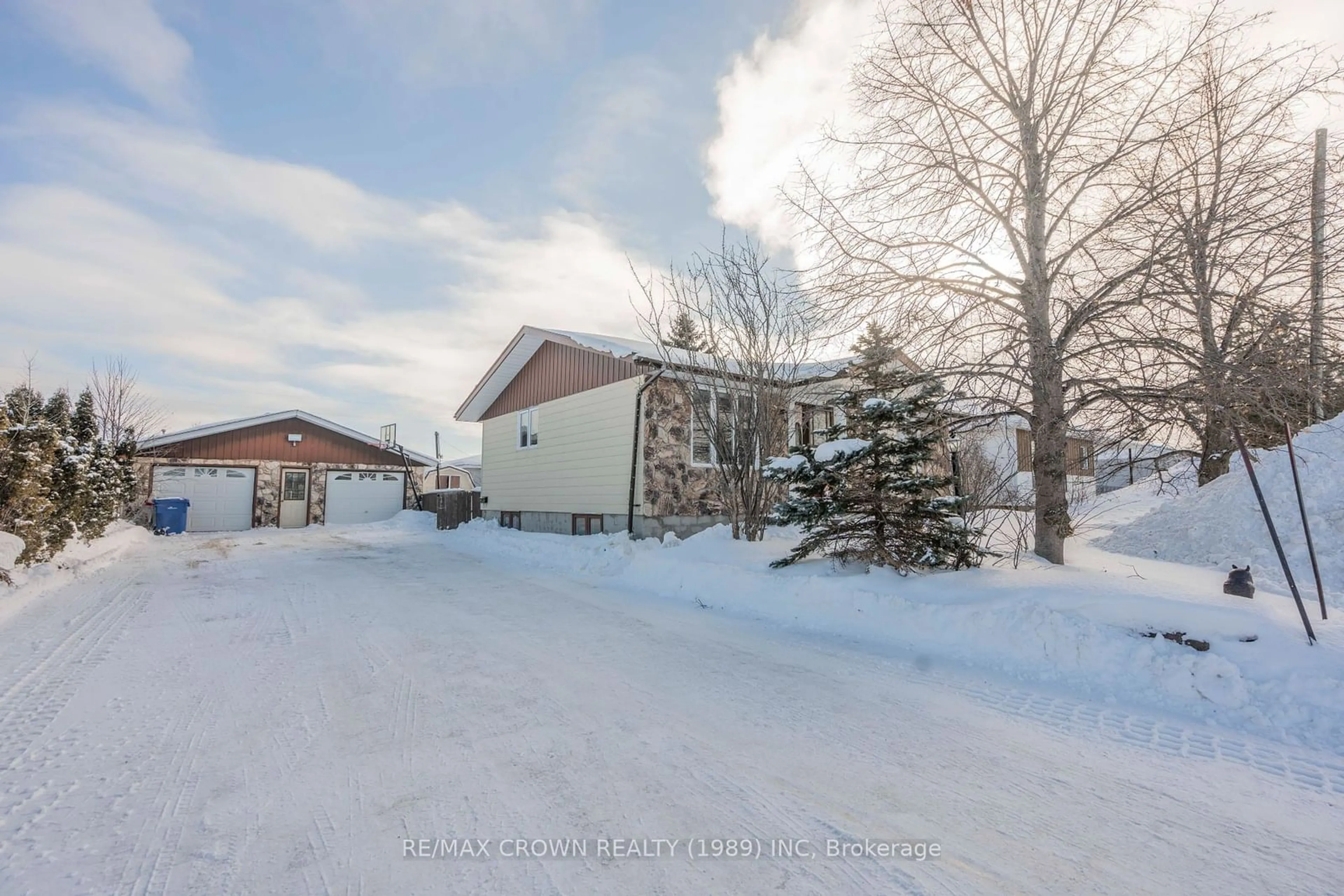 A pic from outside/outdoor area/front of a property/back of a property/a pic from drone, street for 4 Erickson Ave, Kapuskasing Ontario P5N 2K7