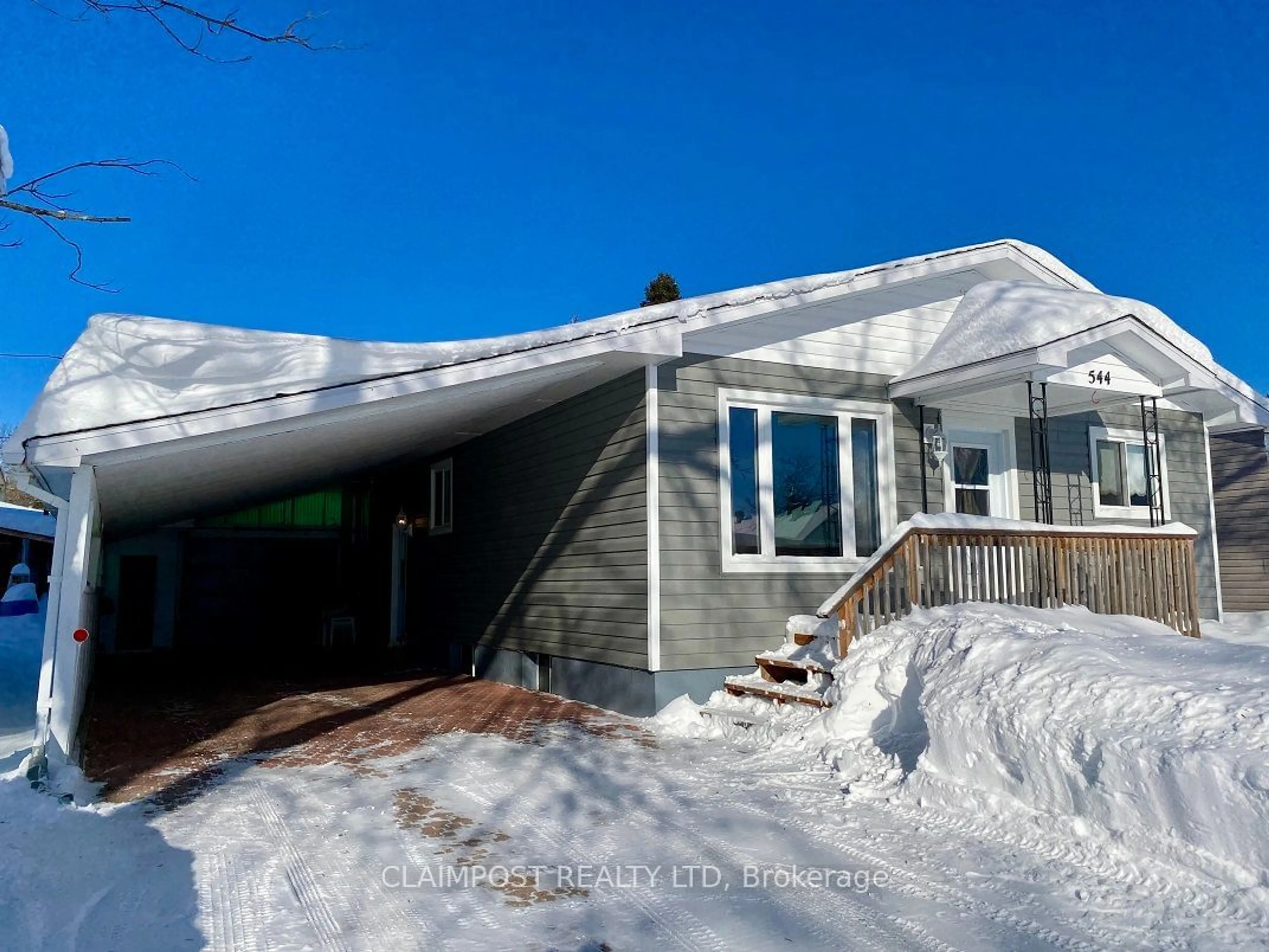 Home with vinyl exterior material, street for 544 Paradis St, Iroquois Falls Ontario P0K 1E0