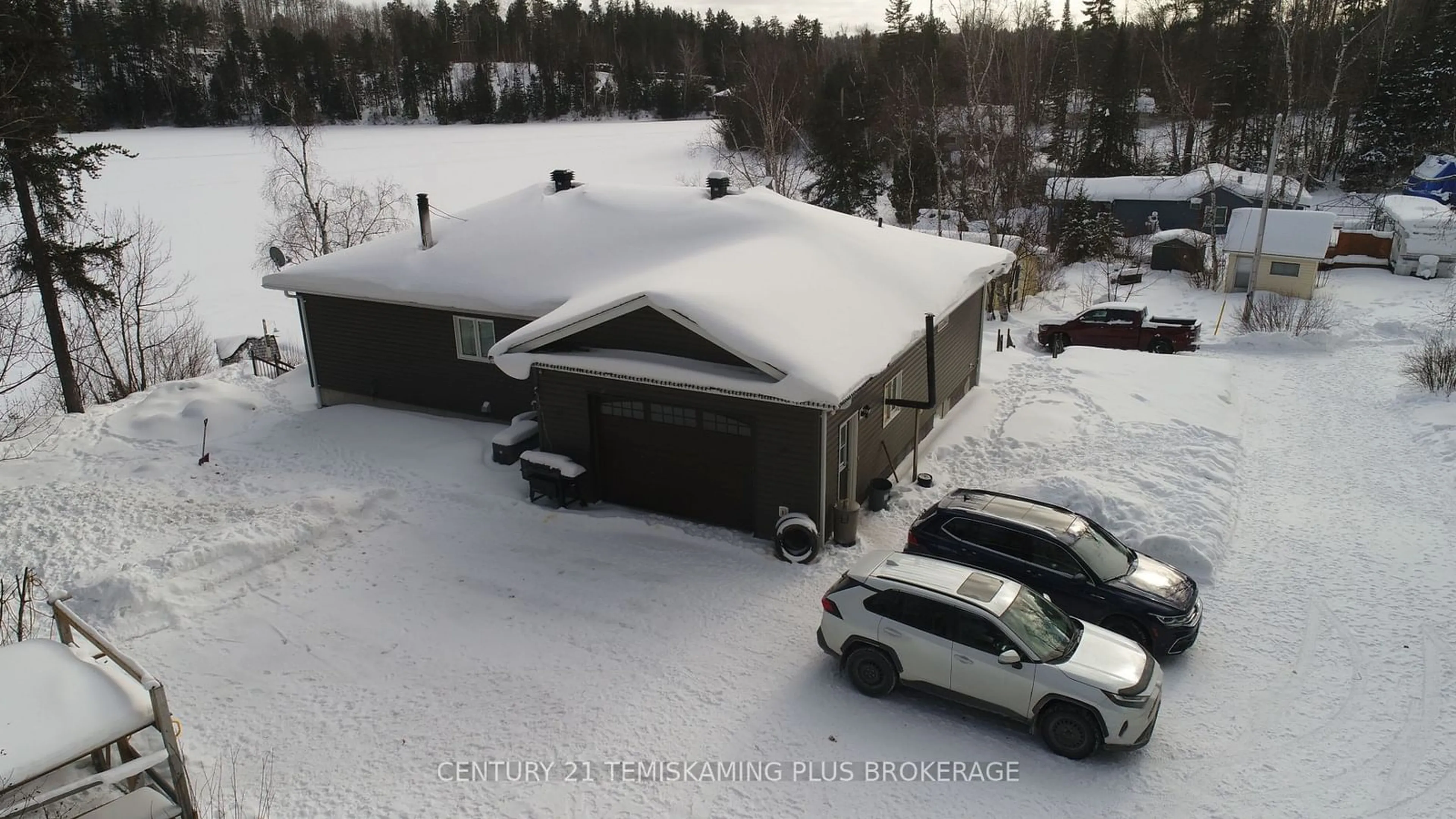 A pic from outside/outdoor area/front of a property/back of a property/a pic from drone, street for 1188 Twin Lakes - A Rd, Hudson Ontario P0J 1P0