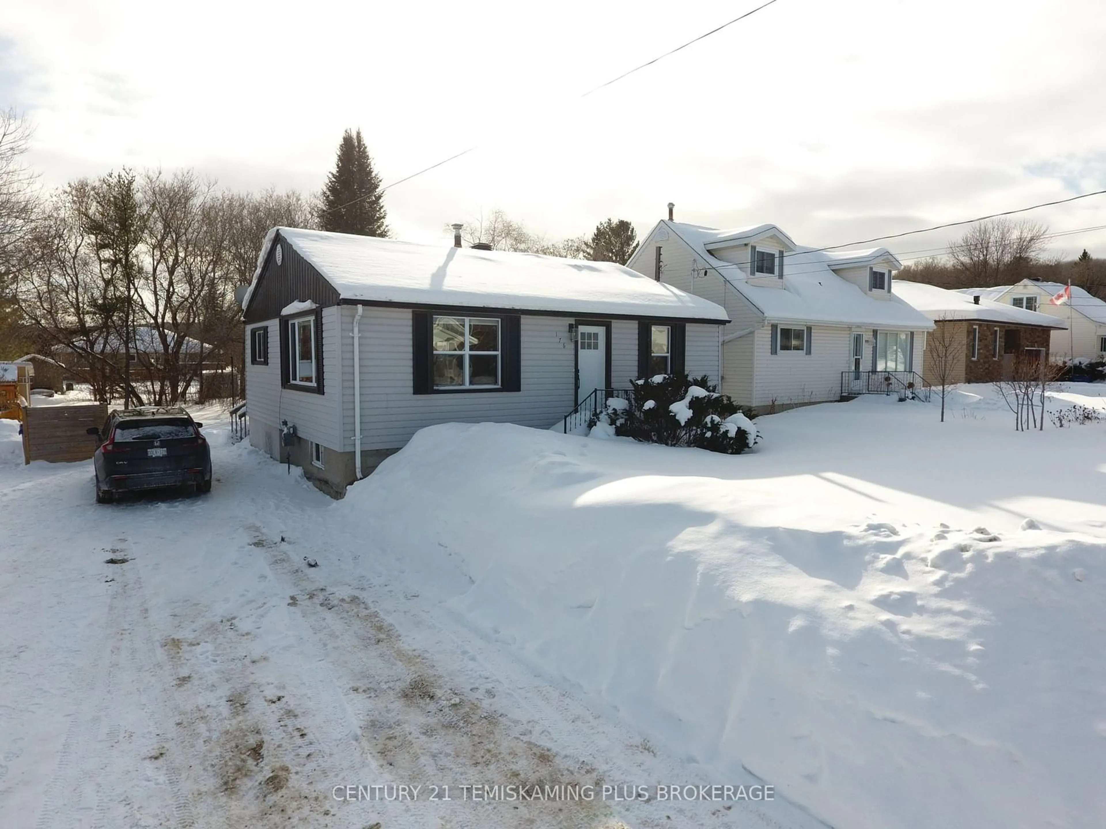 A pic from outside/outdoor area/front of a property/back of a property/a pic from drone, street for 176 Montgomery Ave, Temiskaming Shores Ontario P0J 1P0