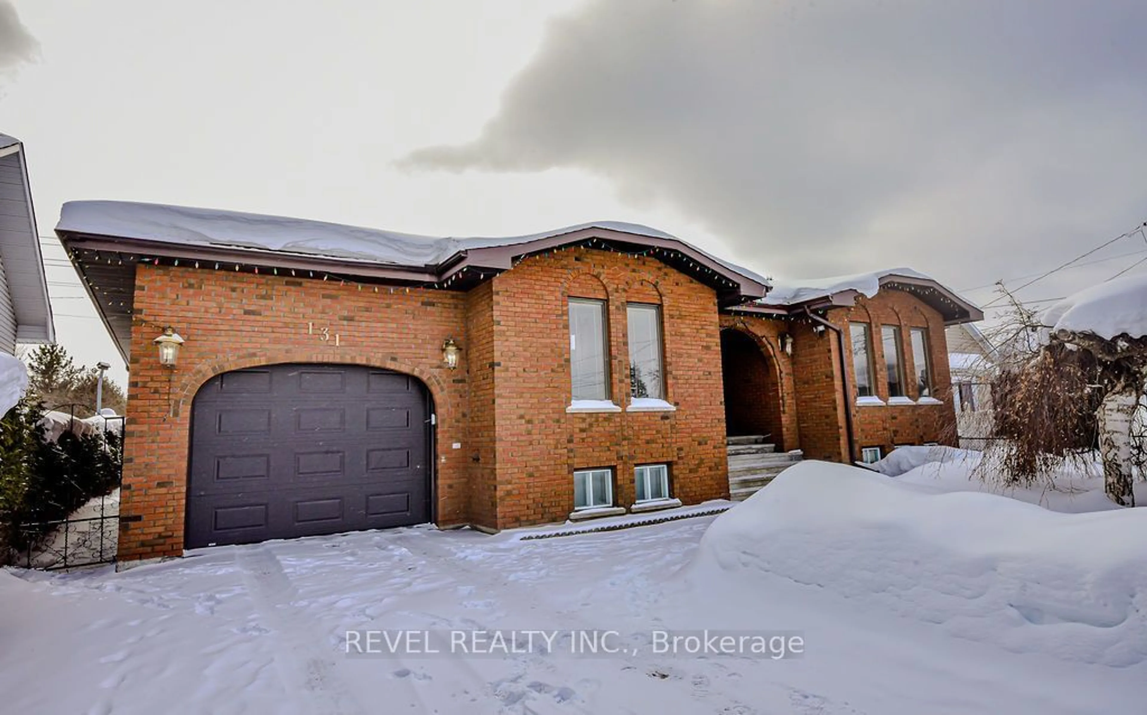 Home with brick exterior material, street for 131 Ogden Ave, Timmins Ontario P4N 8M1