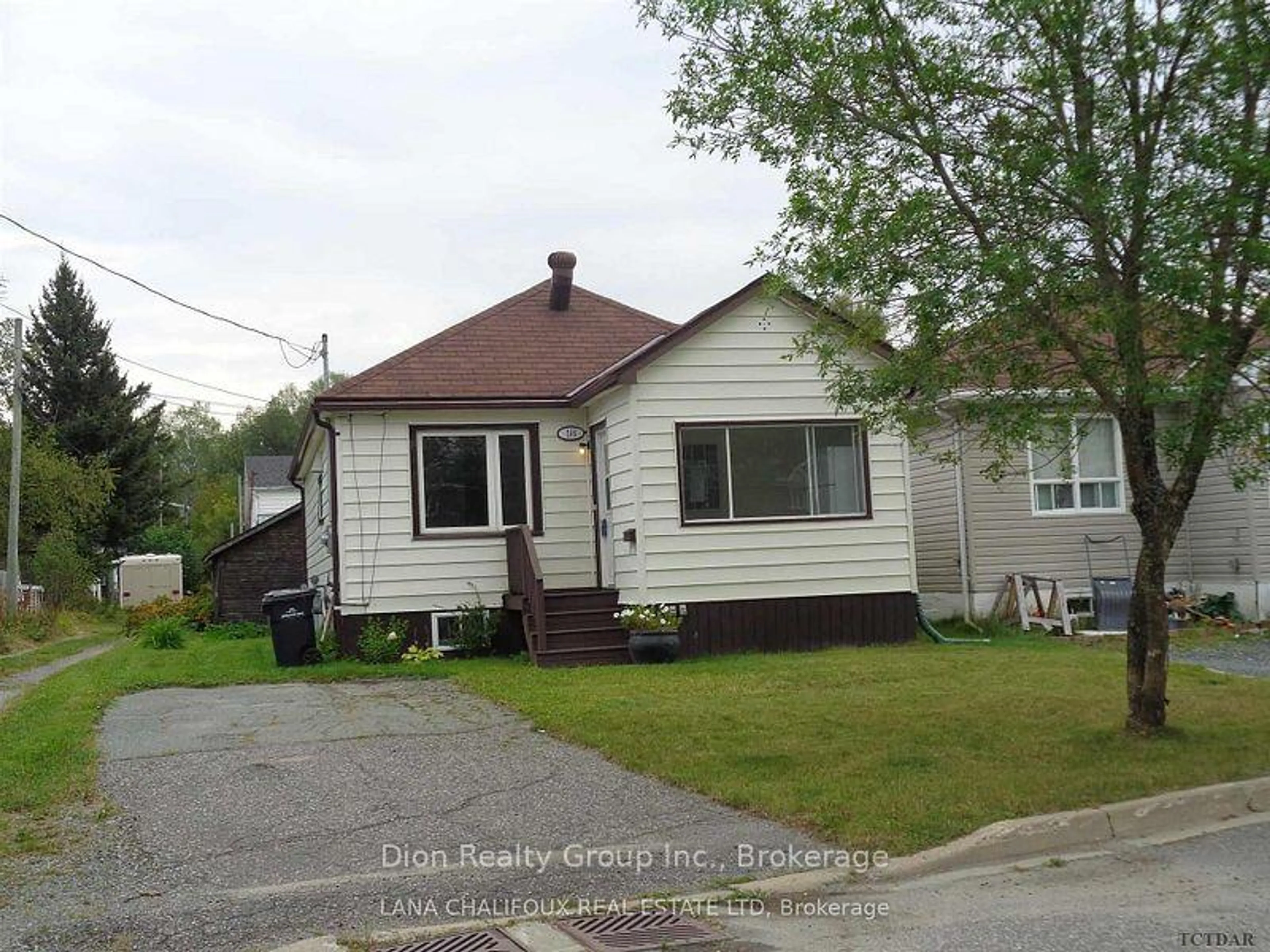 Home with vinyl exterior material, street for 166 Pollock St, Kirkland Lake Ontario P2N 1Z5