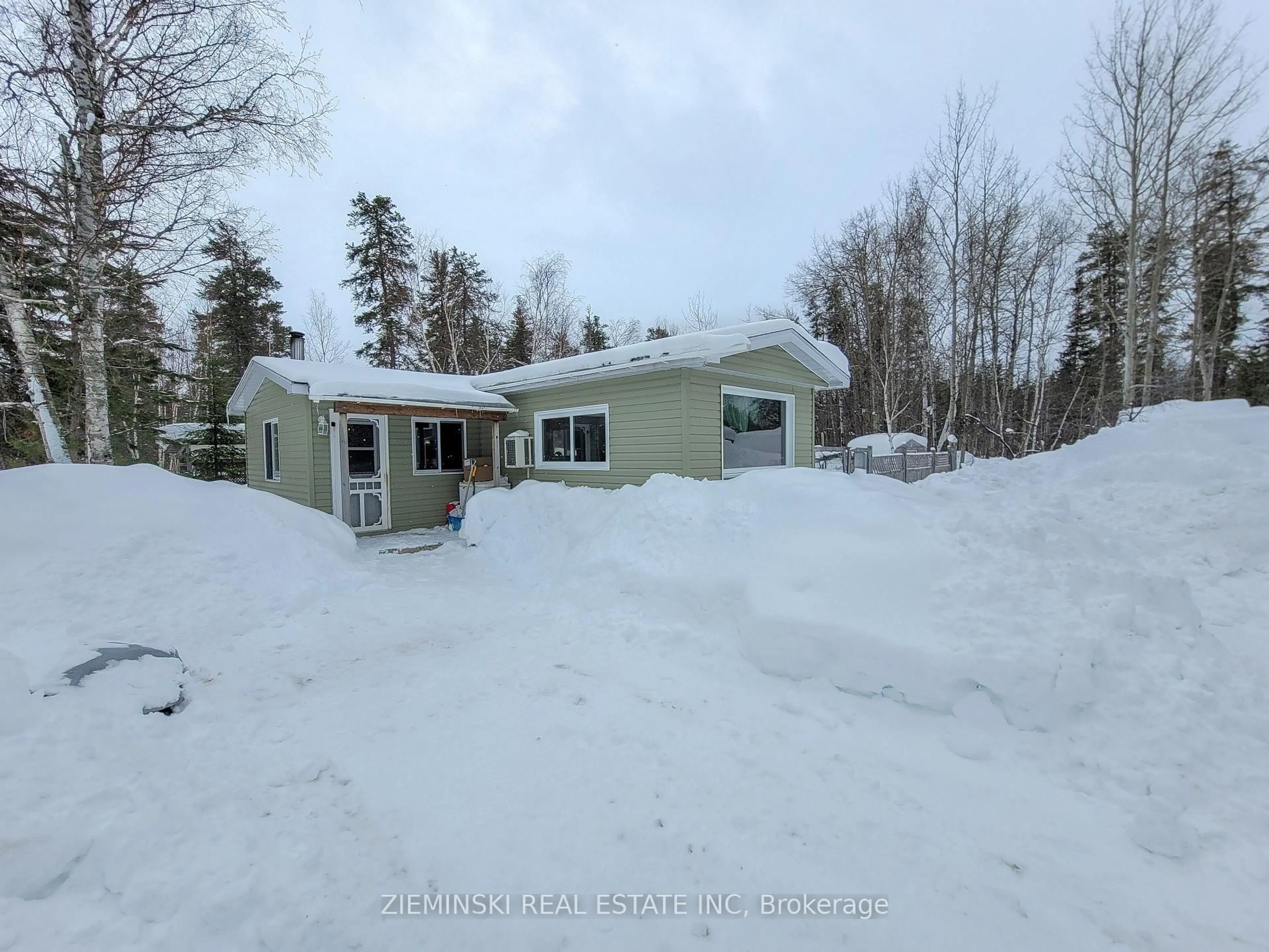 A pic from outside/outdoor area/front of a property/back of a property/a pic from drone, street for 1001 Wilson Lake Rd, Iroquois Falls Ontario P0K 1G0