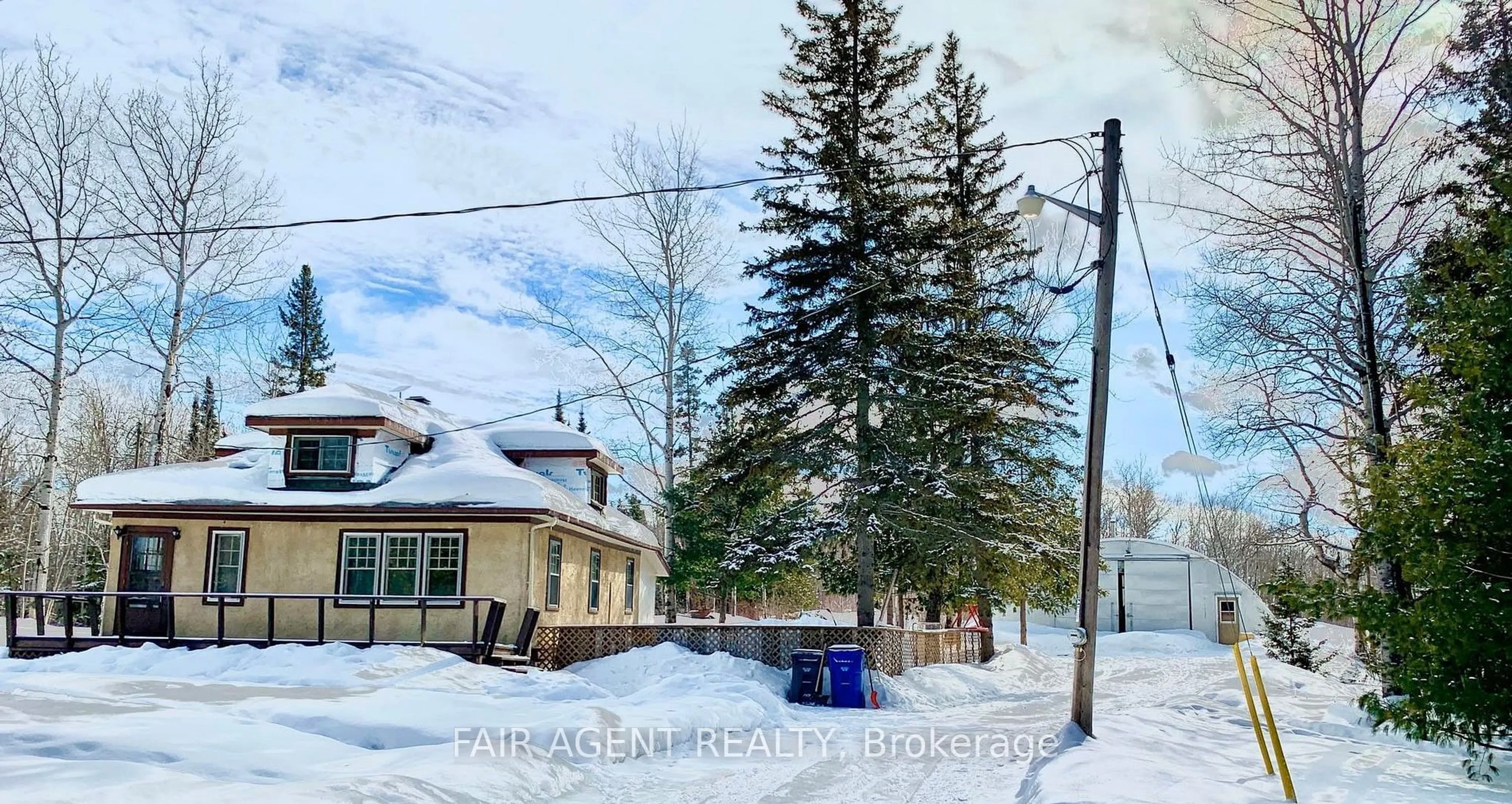 A pic from outside/outdoor area/front of a property/back of a property/a pic from drone, street for 975140 Silver Centre Rd, Temiskaming Shores Ontario P0J 1R0