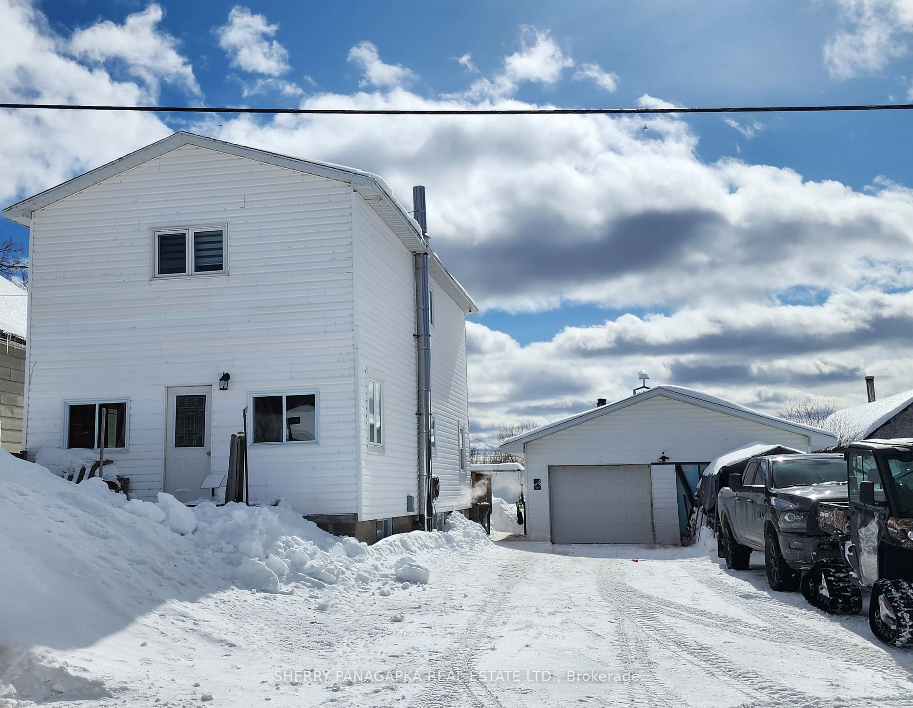 A pic from outside/outdoor area/front of a property/back of a property/a pic from drone, street for 49A & 51 Sixth Ave, Larder Lake Ontario P0K 1L0