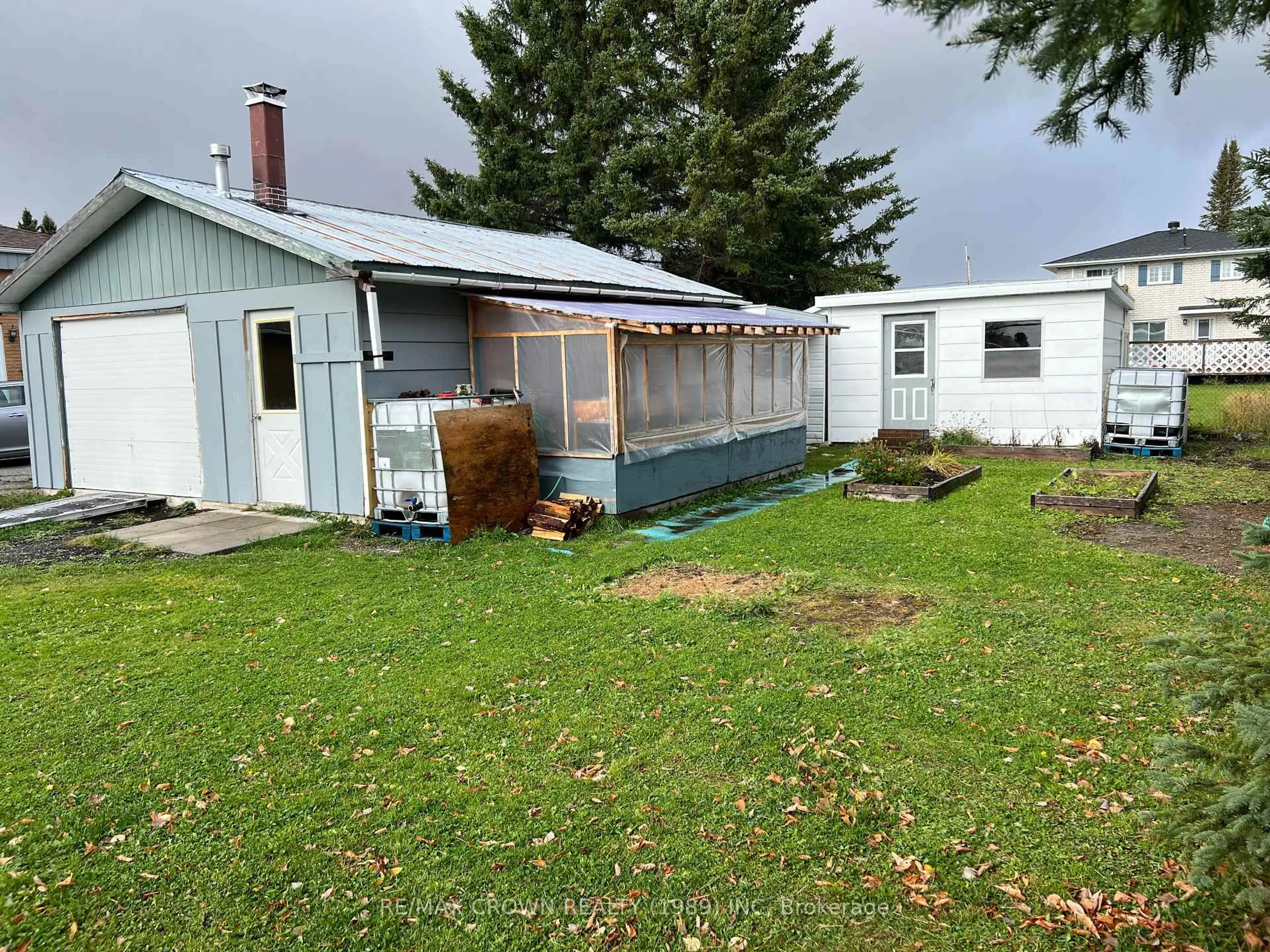 A pic from outside/outdoor area/front of a property/back of a property/a pic from drone, unknown for 21 Jacques Ave, Fauquier-Strickland Ontario P0L 1G0
