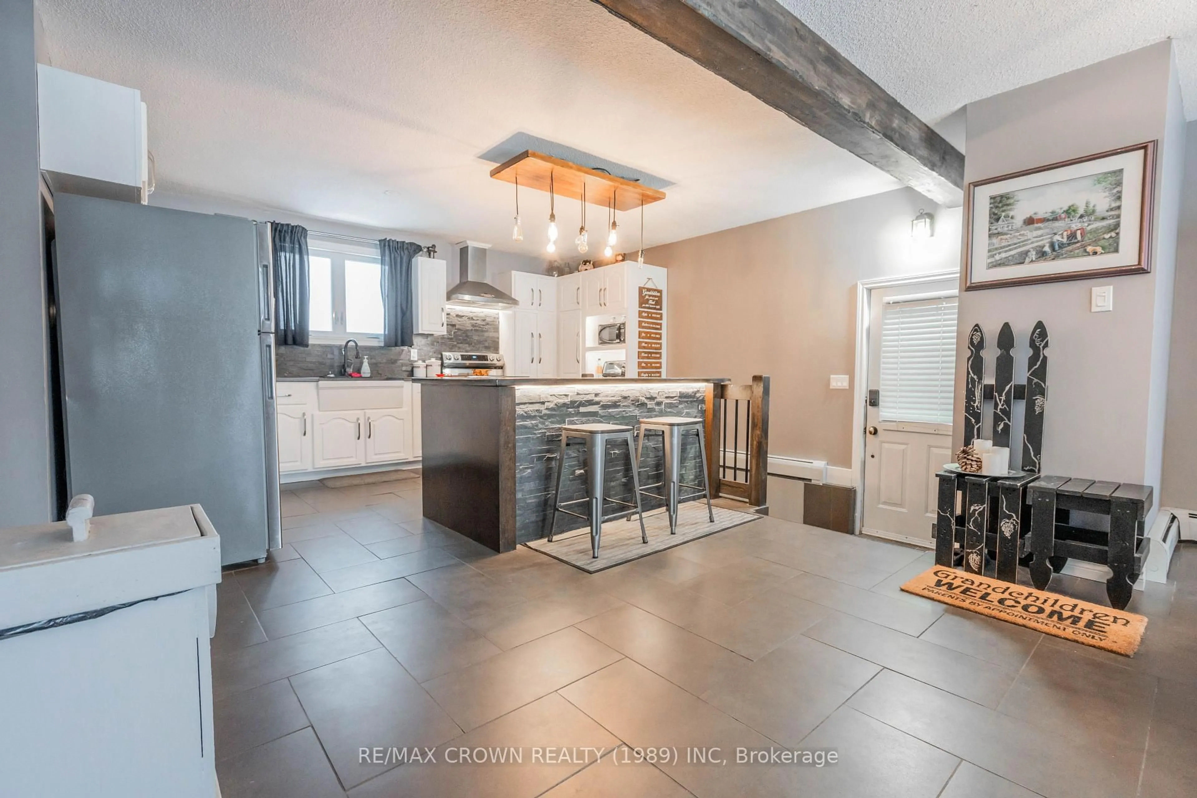 Open concept kitchen, ceramic/tile floor for 14 St-Stanislas St, Kapuskasing Ontario P0L 1M0