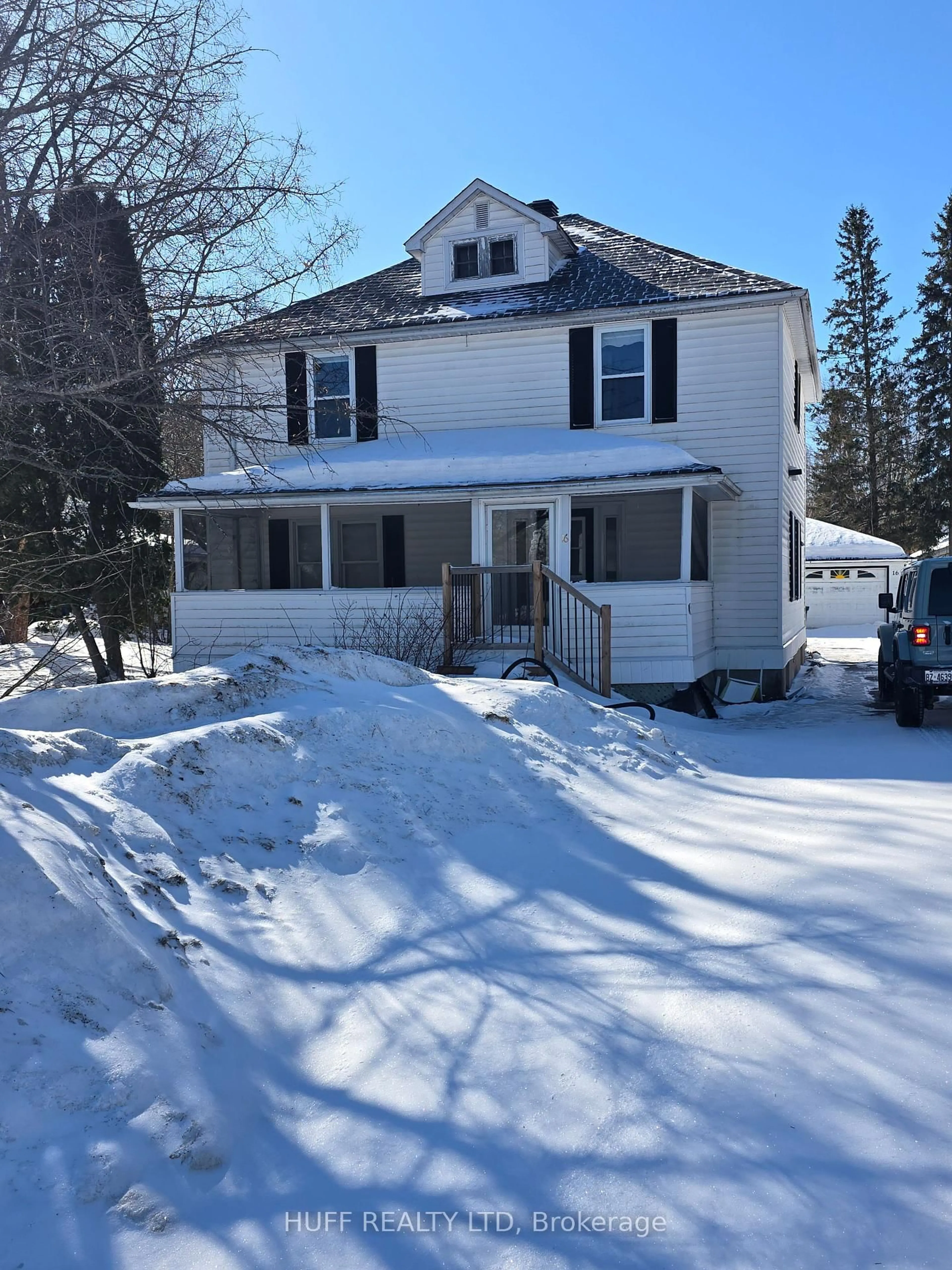 Home with vinyl exterior material, street for 16 Seventh Ave, Englehart Ontario P0J 1H0