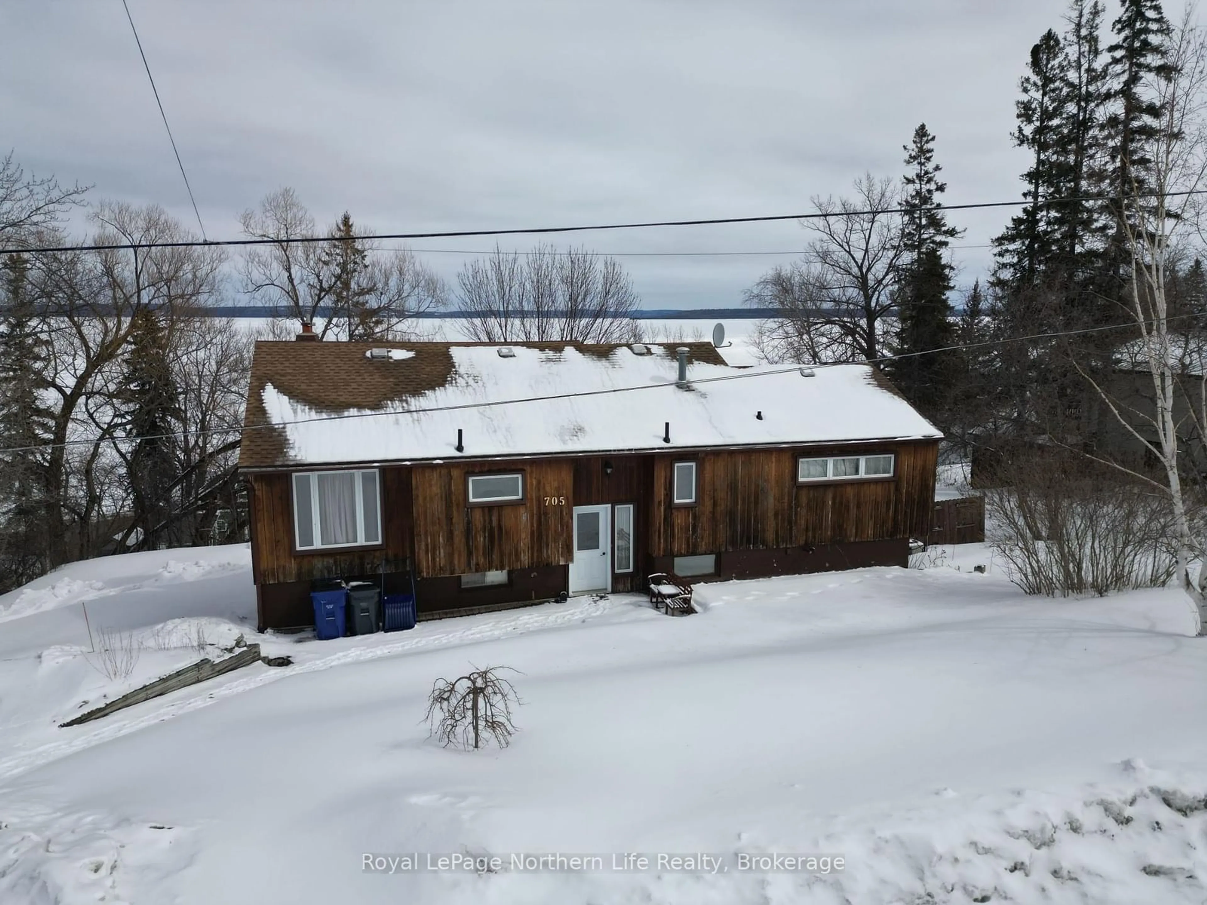 A pic from outside/outdoor area/front of a property/back of a property/a pic from drone, street for 705 Rorke Ave, Temiskaming Shores Ontario P0J 1K0