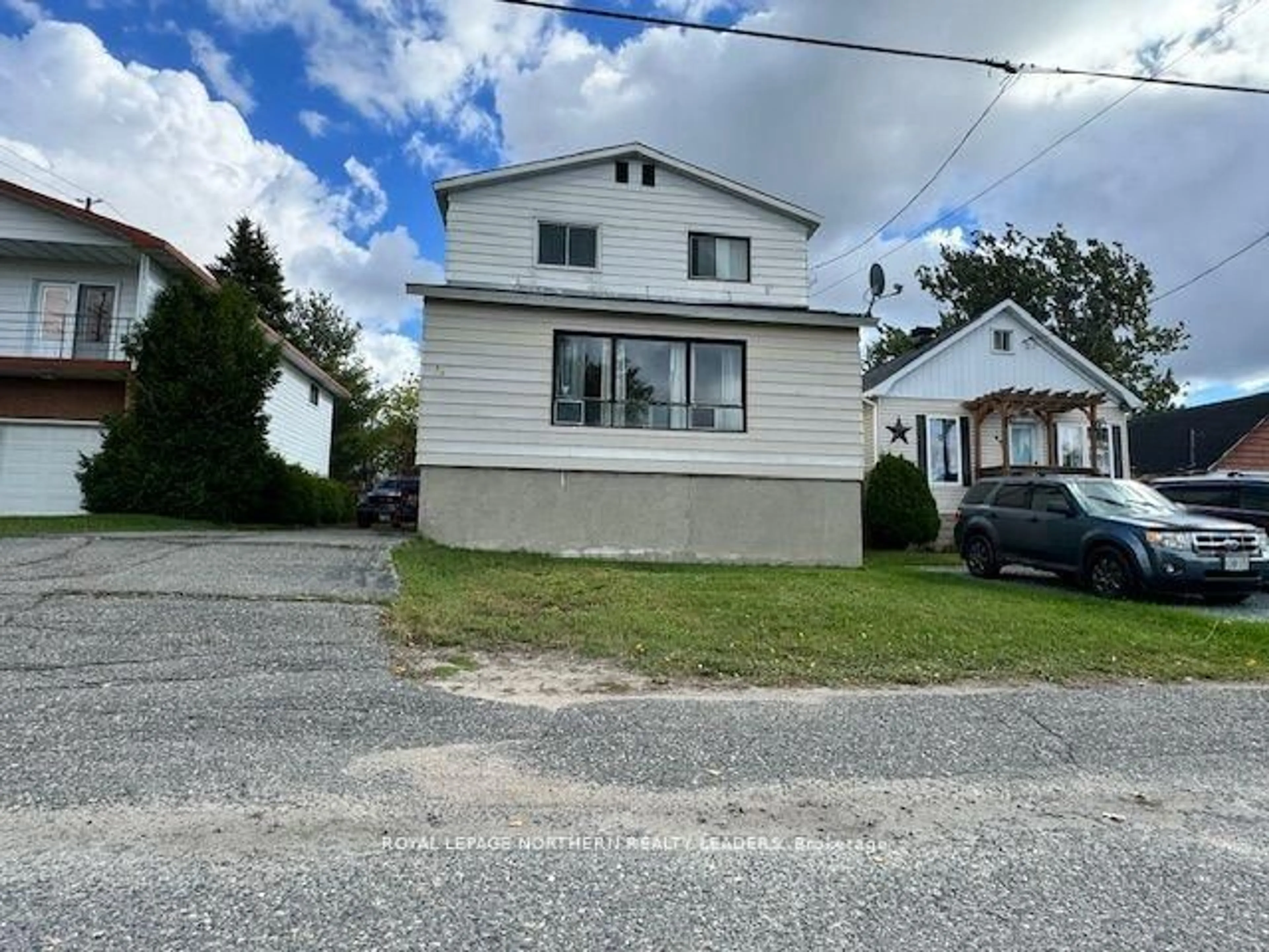 A pic from outside/outdoor area/front of a property/back of a property/a pic from drone, street for 464 Cedar St, Timmins Ontario P4N 2J1
