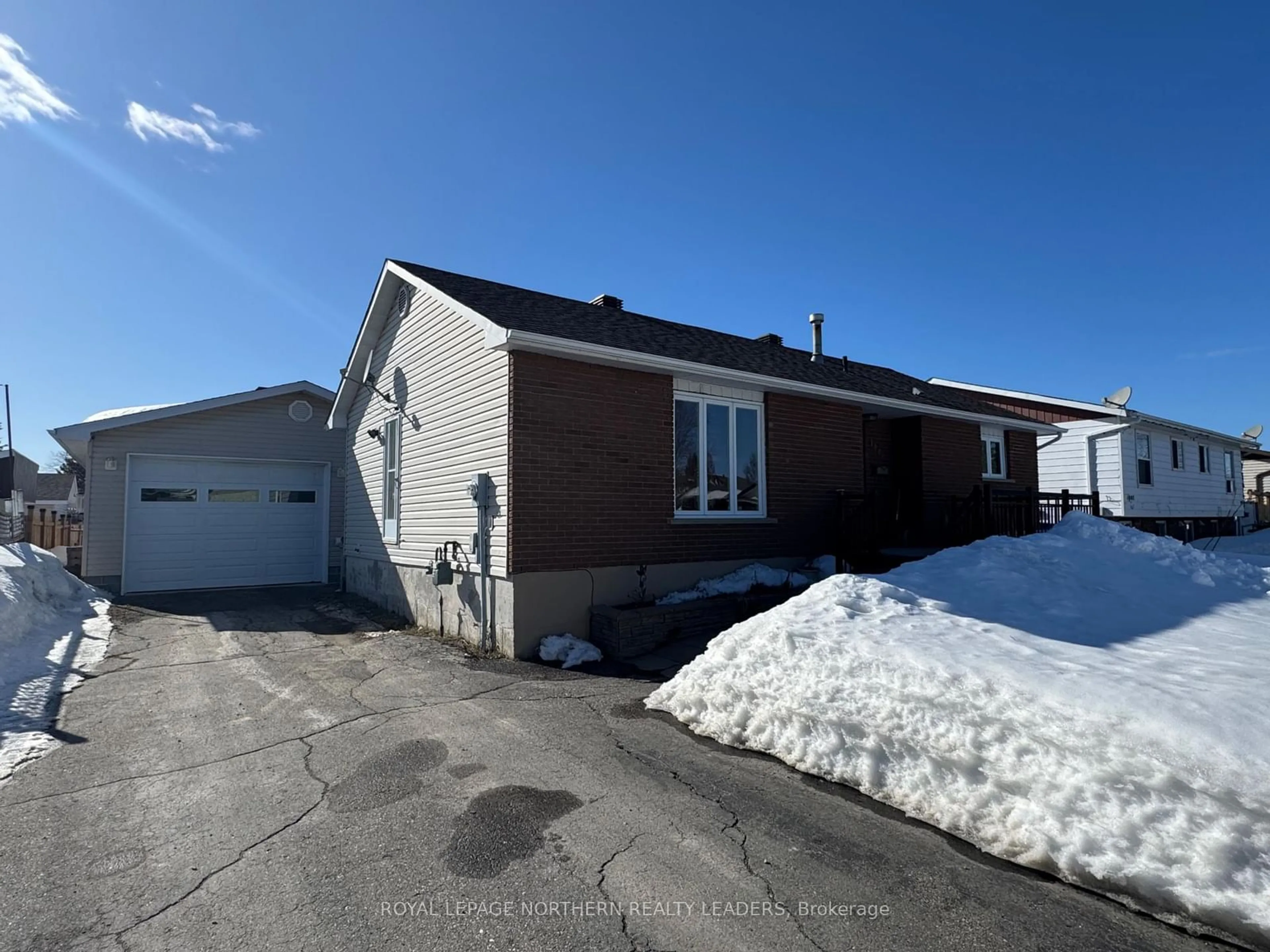 A pic from outside/outdoor area/front of a property/back of a property/a pic from drone, street for 1001 Denise St, Timmins Ontario P4P 1C3