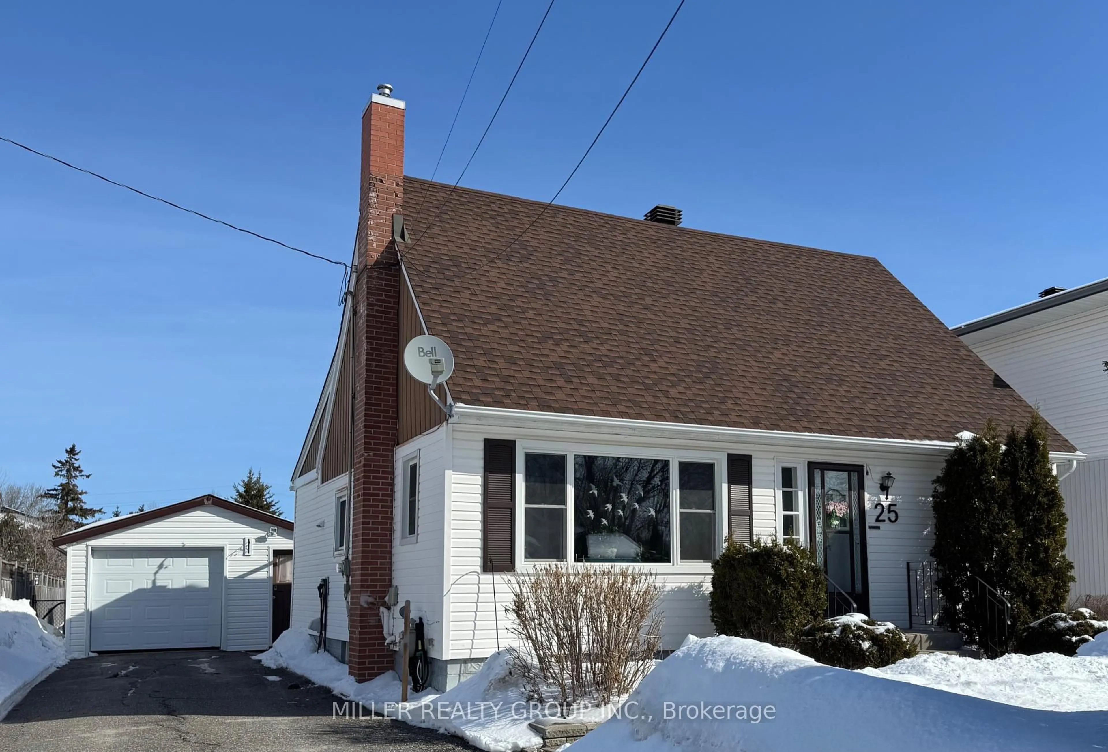 Home with vinyl exterior material, street for 25 Pine Ave, Temiskaming Shores Ontario P0J 1P0
