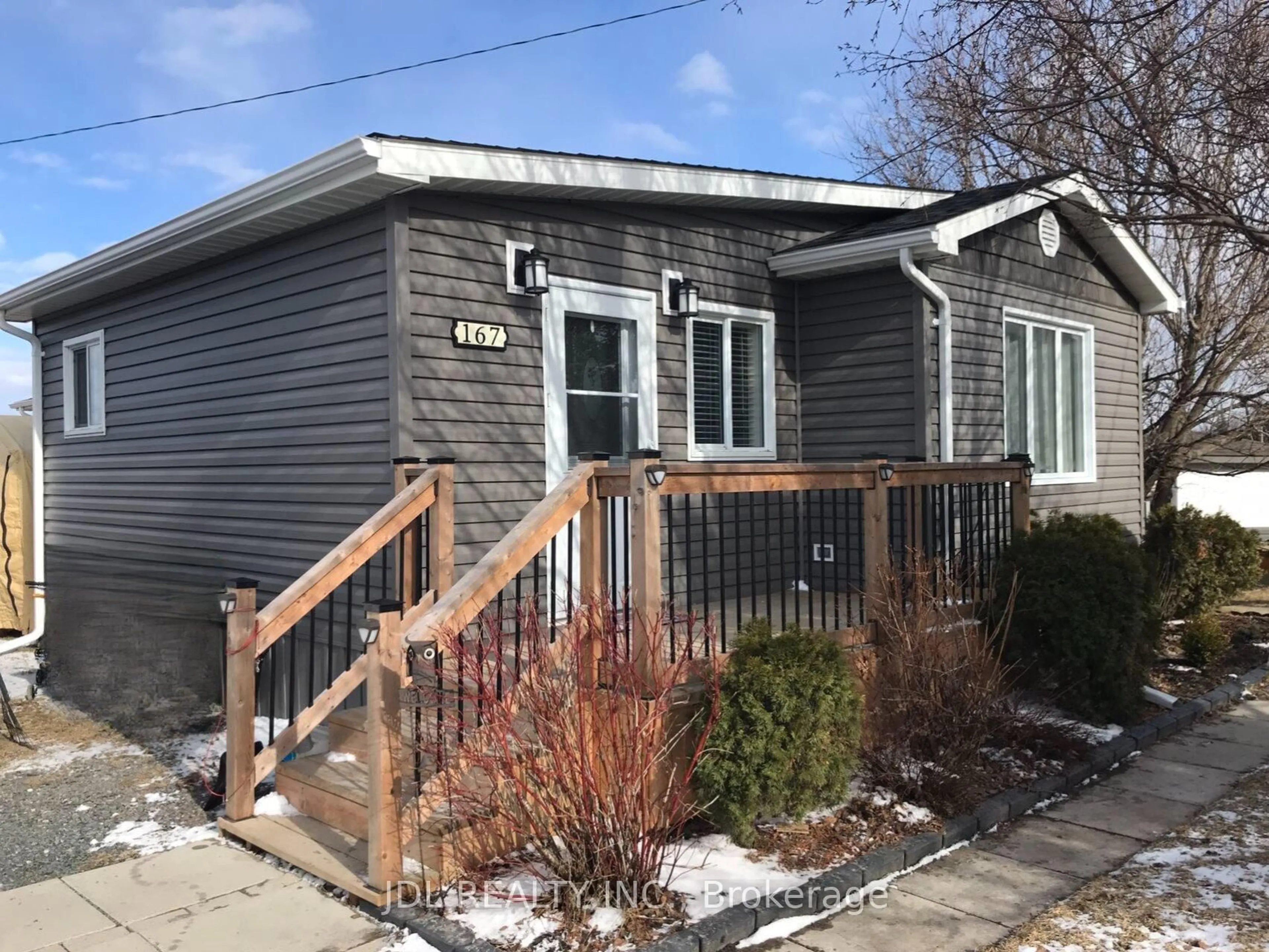 Home with vinyl exterior material, street for 167 2nd St, Cochrane Ontario P0L 1C0
