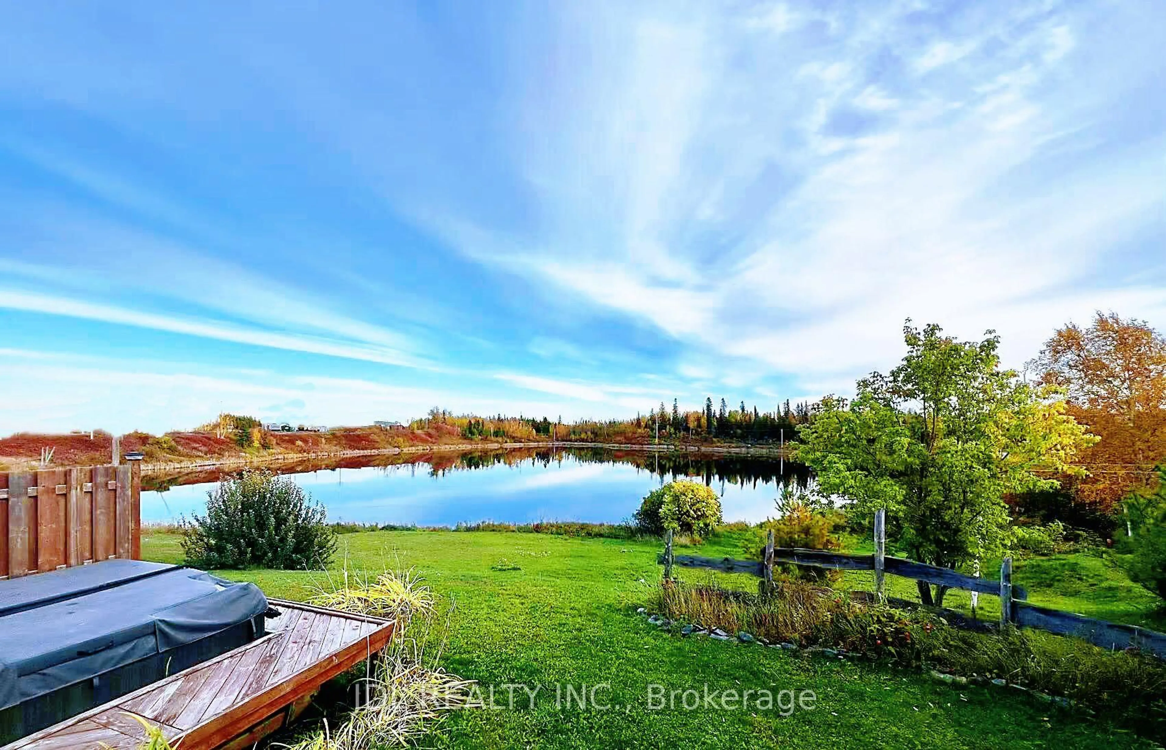 A pic from outside/outdoor area/front of a property/back of a property/a pic from drone, water/lake/river/ocean view for 167 2nd St, Cochrane Ontario P0L 1C0