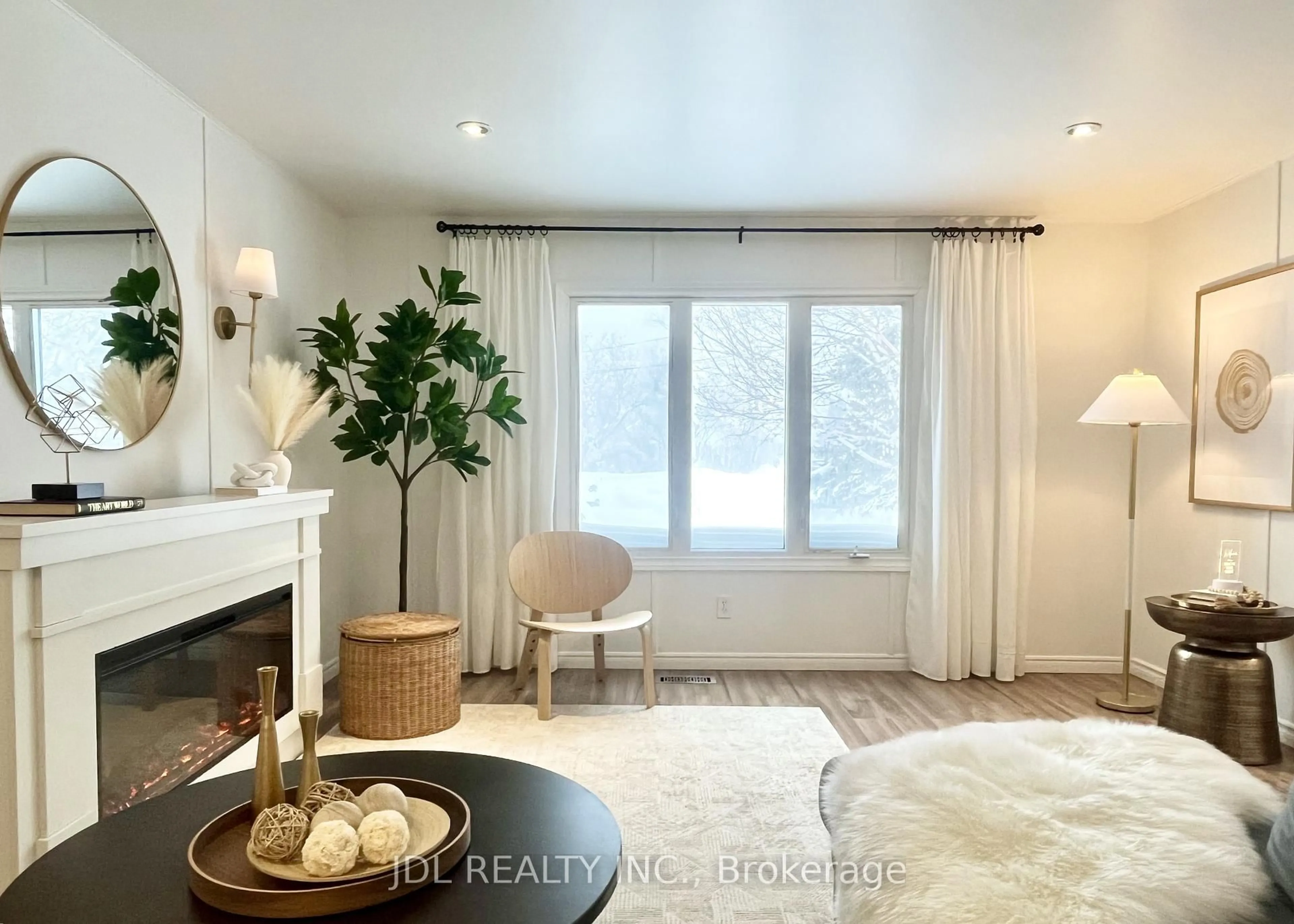 Living room with furniture, wood/laminate floor for 167 2nd St, Cochrane Ontario P0L 1C0