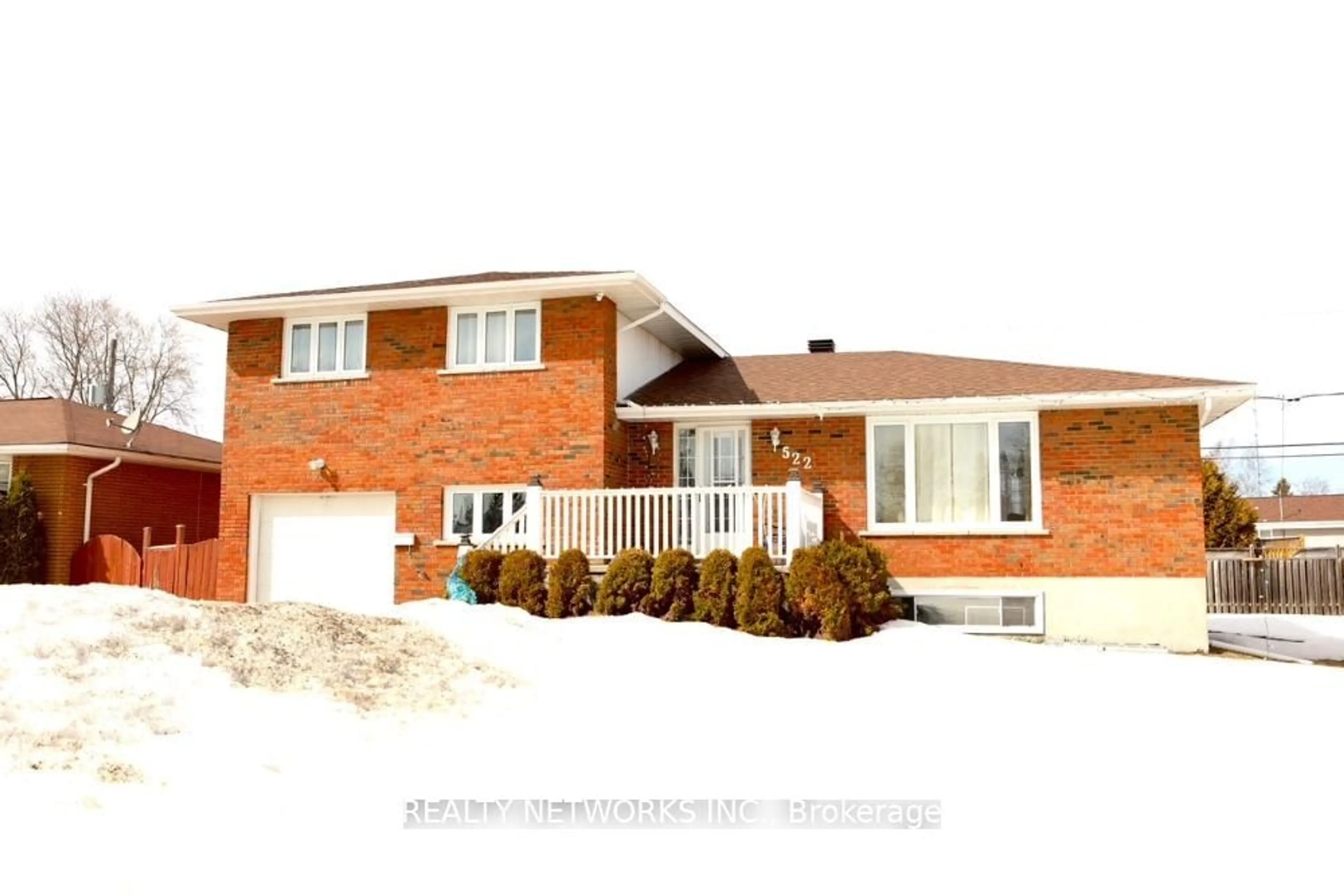 Home with brick exterior material, street for 522 Spooner Dr, Timmins Ontario P4N 4R5