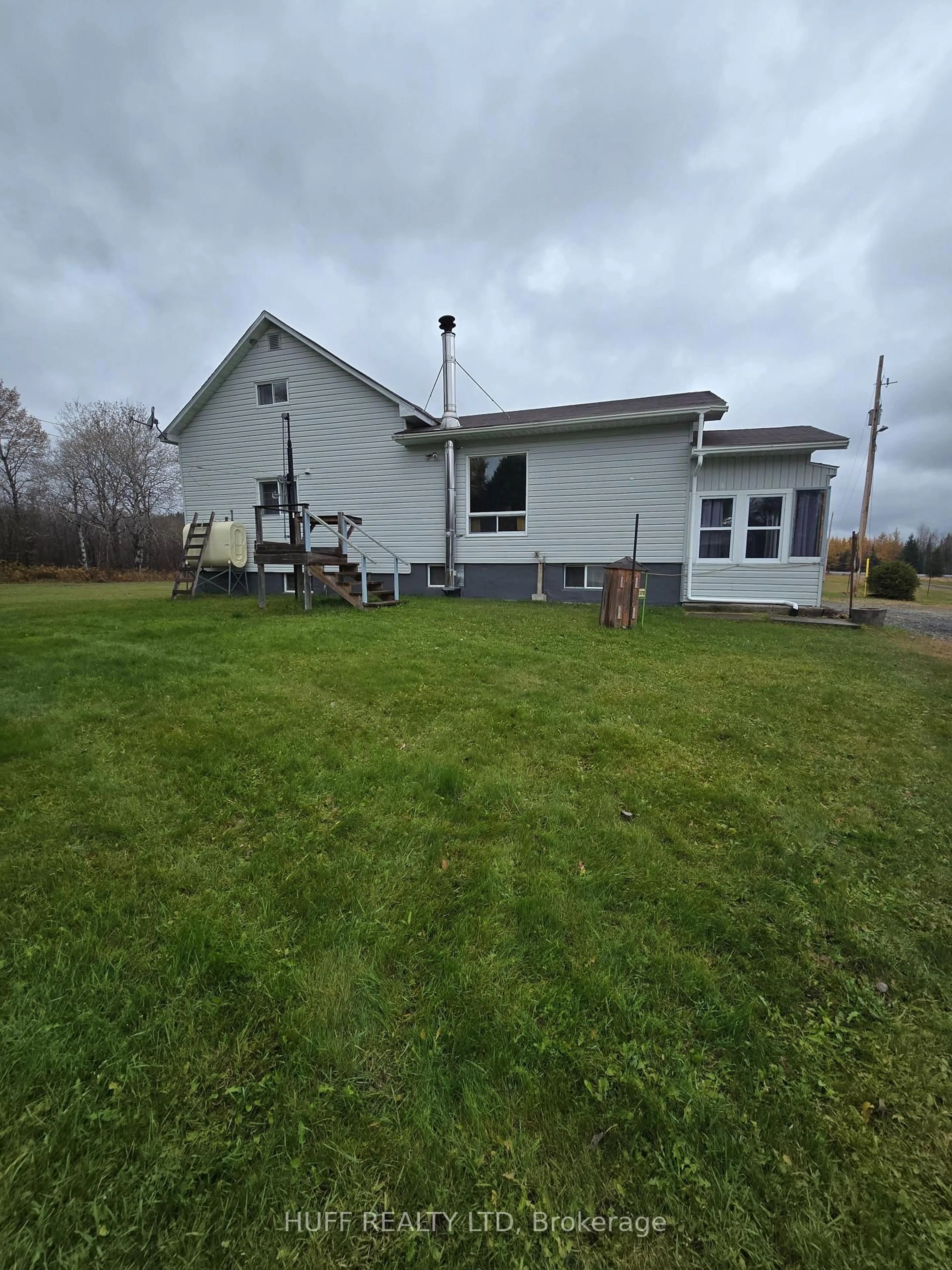 A pic from outside/outdoor area/front of a property/back of a property/a pic from drone, building for 5775 11 Highway, Kirkland Lake Ontario P0K 1V0