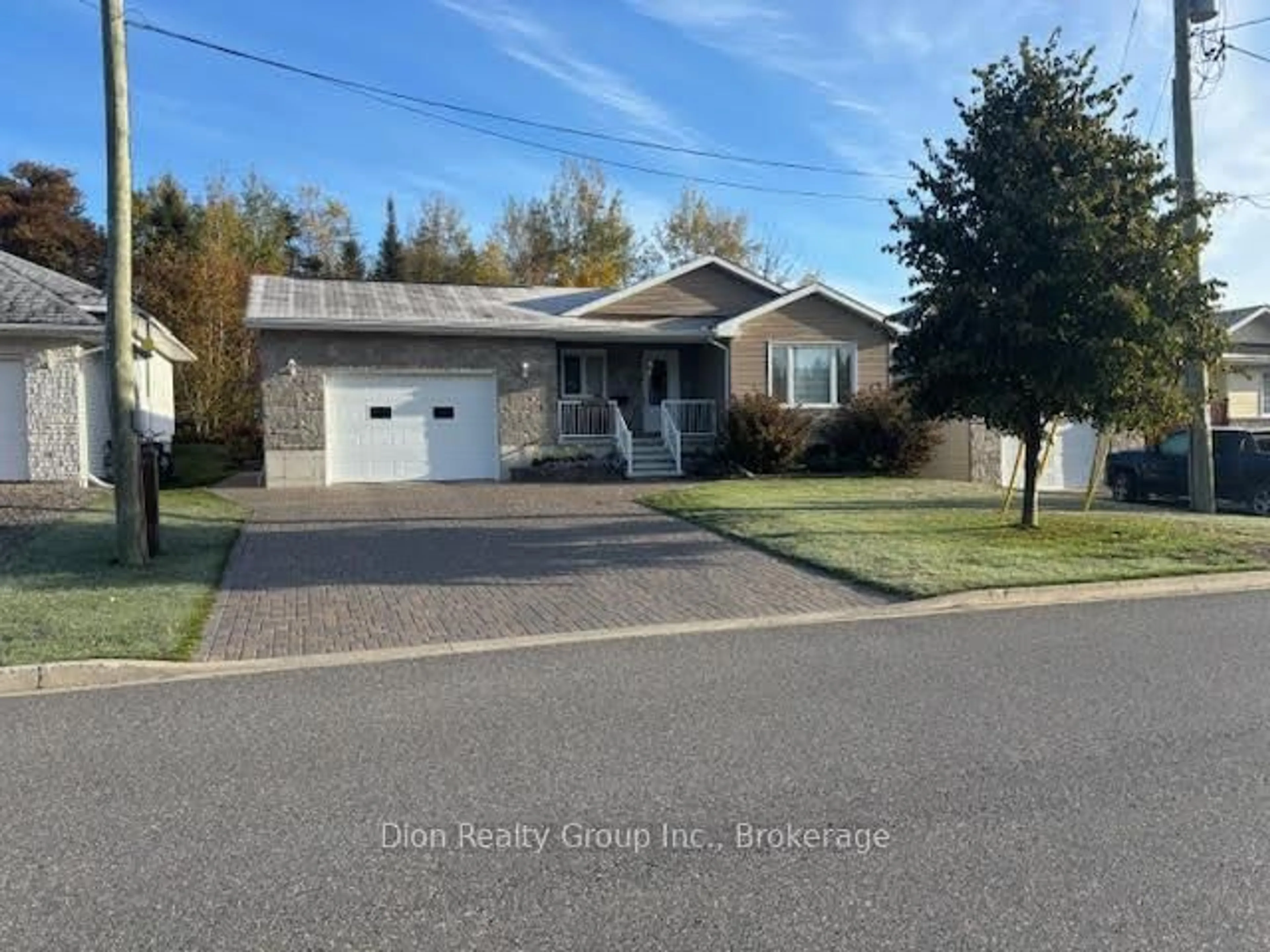 Home with vinyl exterior material, street for 16 Calbeck Ave, Kirkland Lake Ontario P2N 3S1