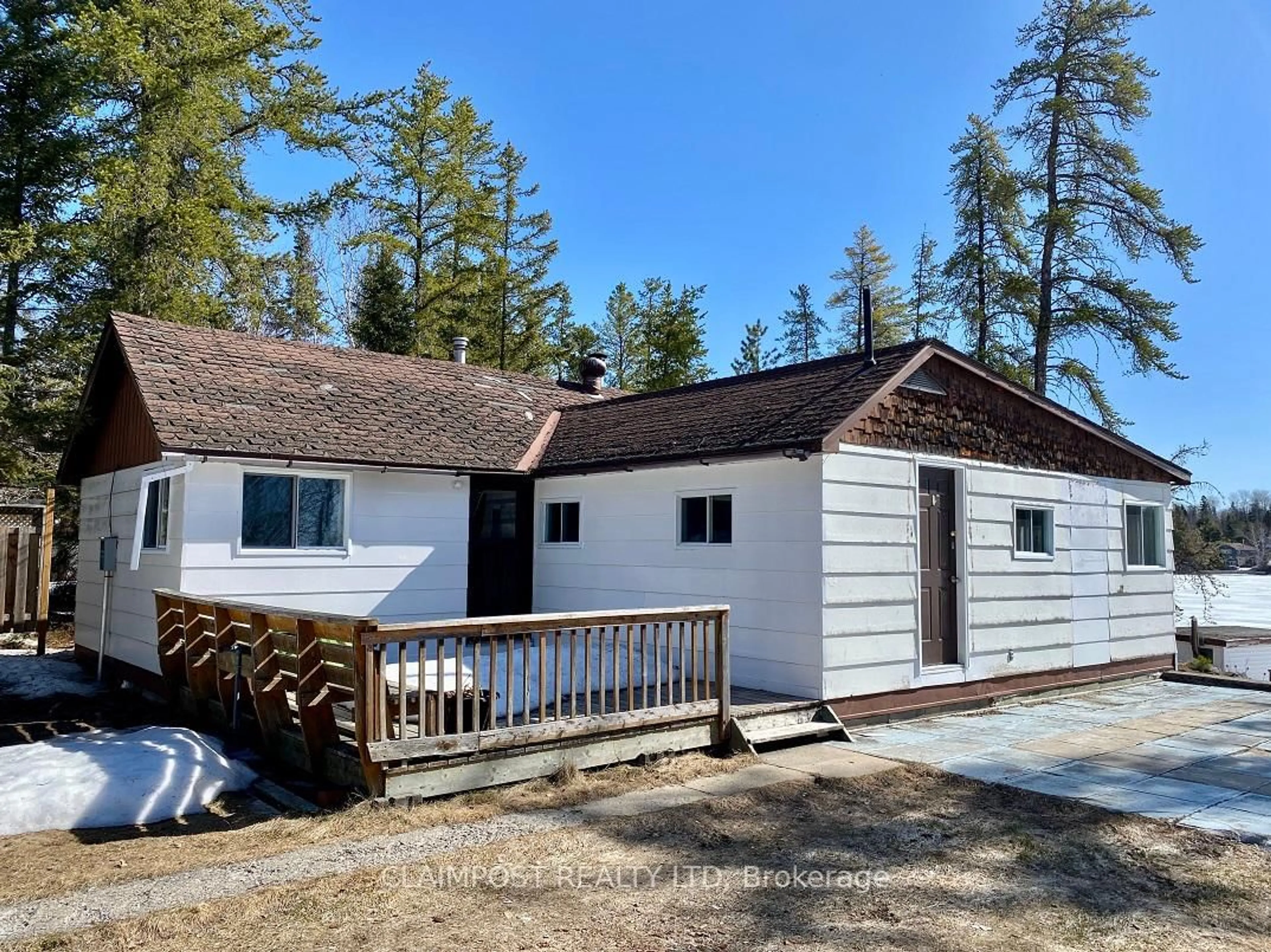 A pic from outside/outdoor area/front of a property/back of a property/a pic from drone, unknown for 3056 Sunset Bay Rd, Iroquois Falls Ontario P0K 1G0
