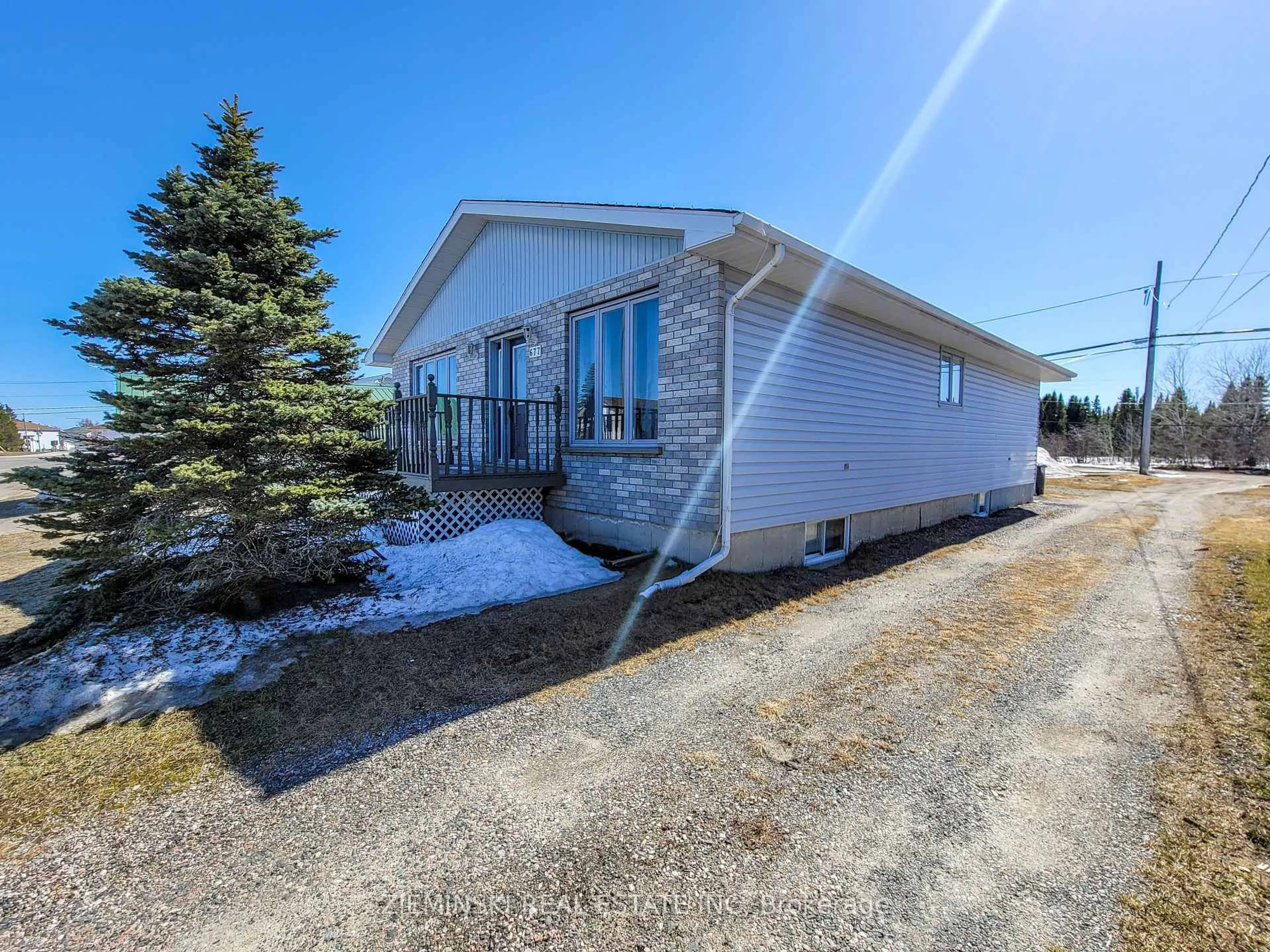 Home with vinyl exterior material, street for 677 Victoria Rd, Iroquois Falls Ontario P0K 1G0