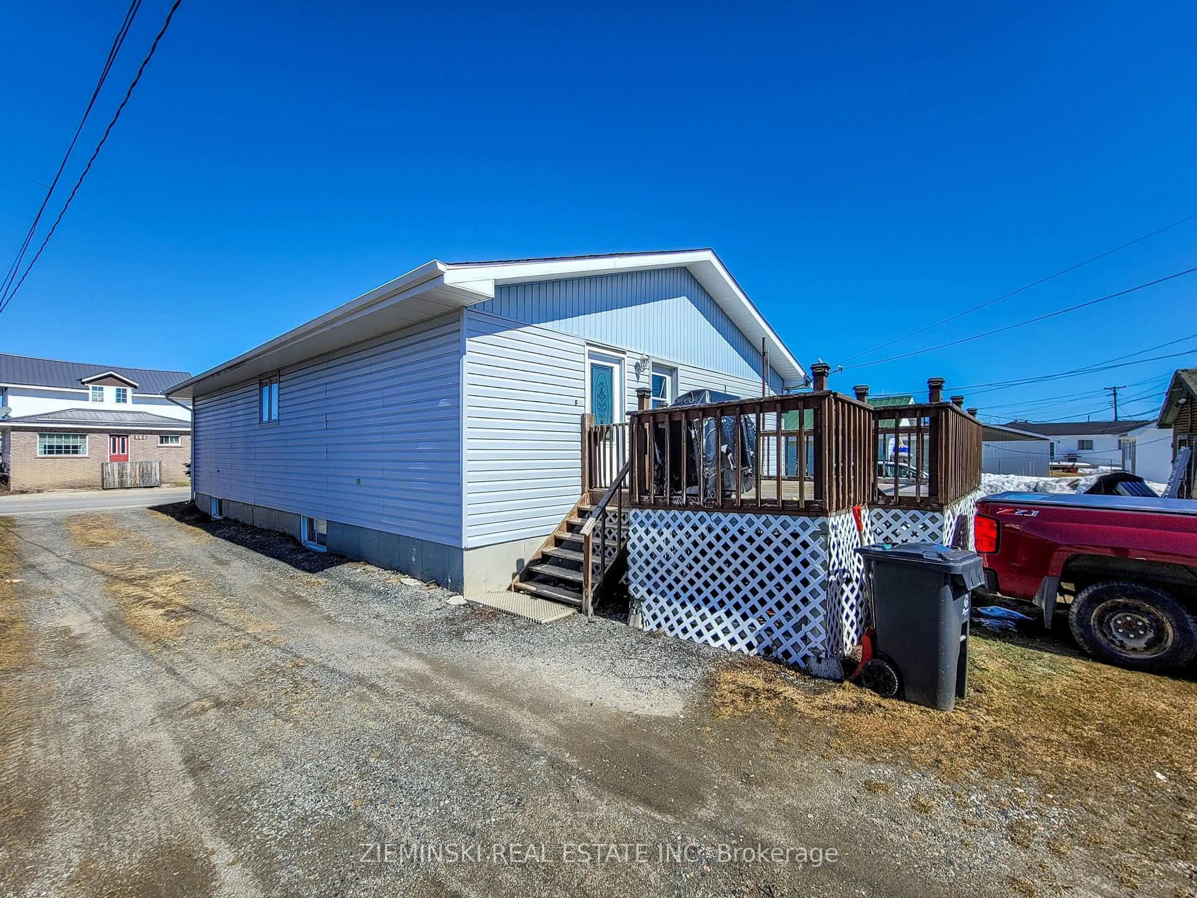 A pic from outside/outdoor area/front of a property/back of a property/a pic from drone, water/lake/river/ocean view for 677 Victoria Rd, Iroquois Falls Ontario P0K 1G0