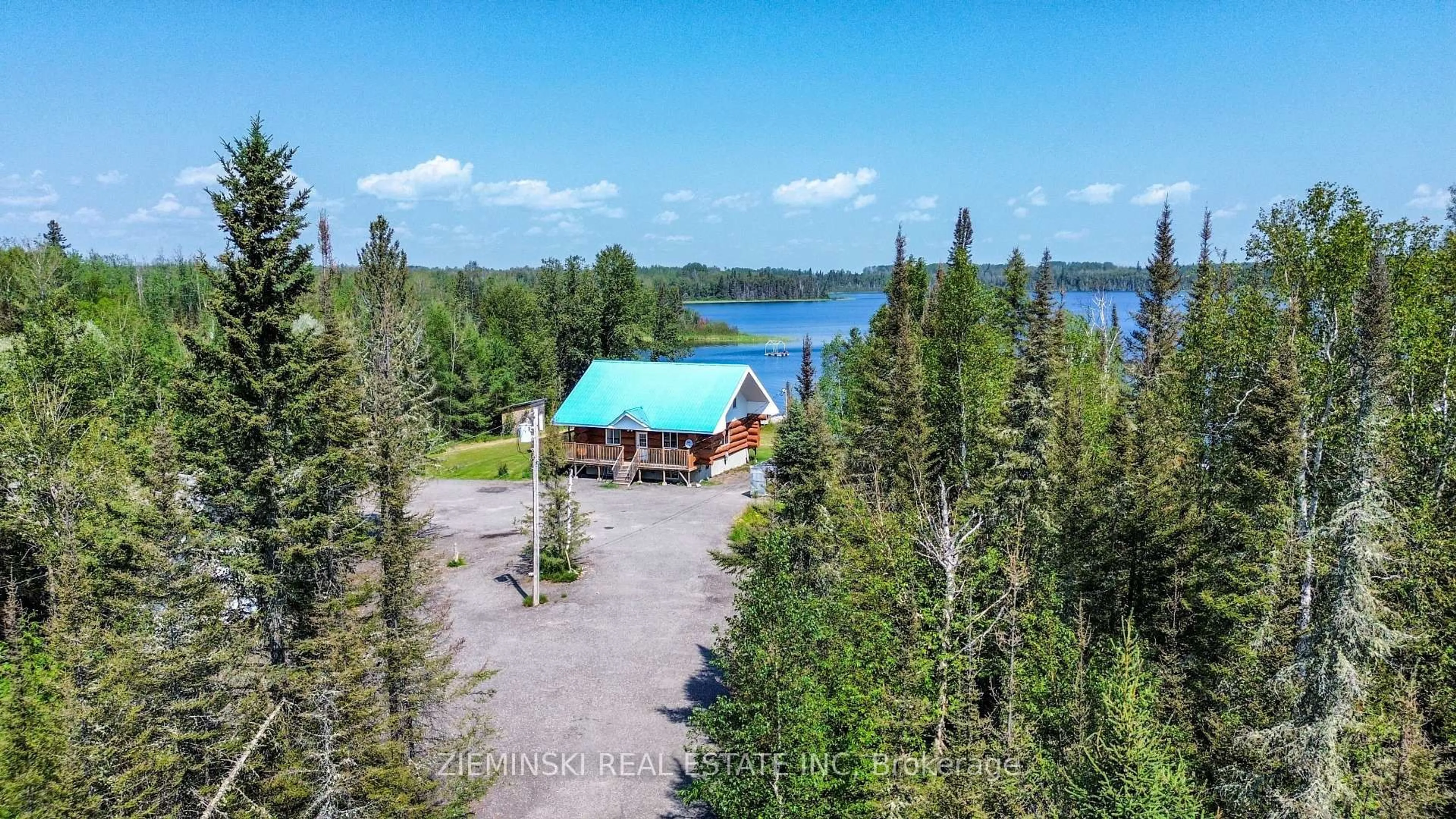 A pic from outside/outdoor area/front of a property/back of a property/a pic from drone, water/lake/river/ocean view for 5942 101 West Highway, Black River Matheson Ontario P0K 1N0