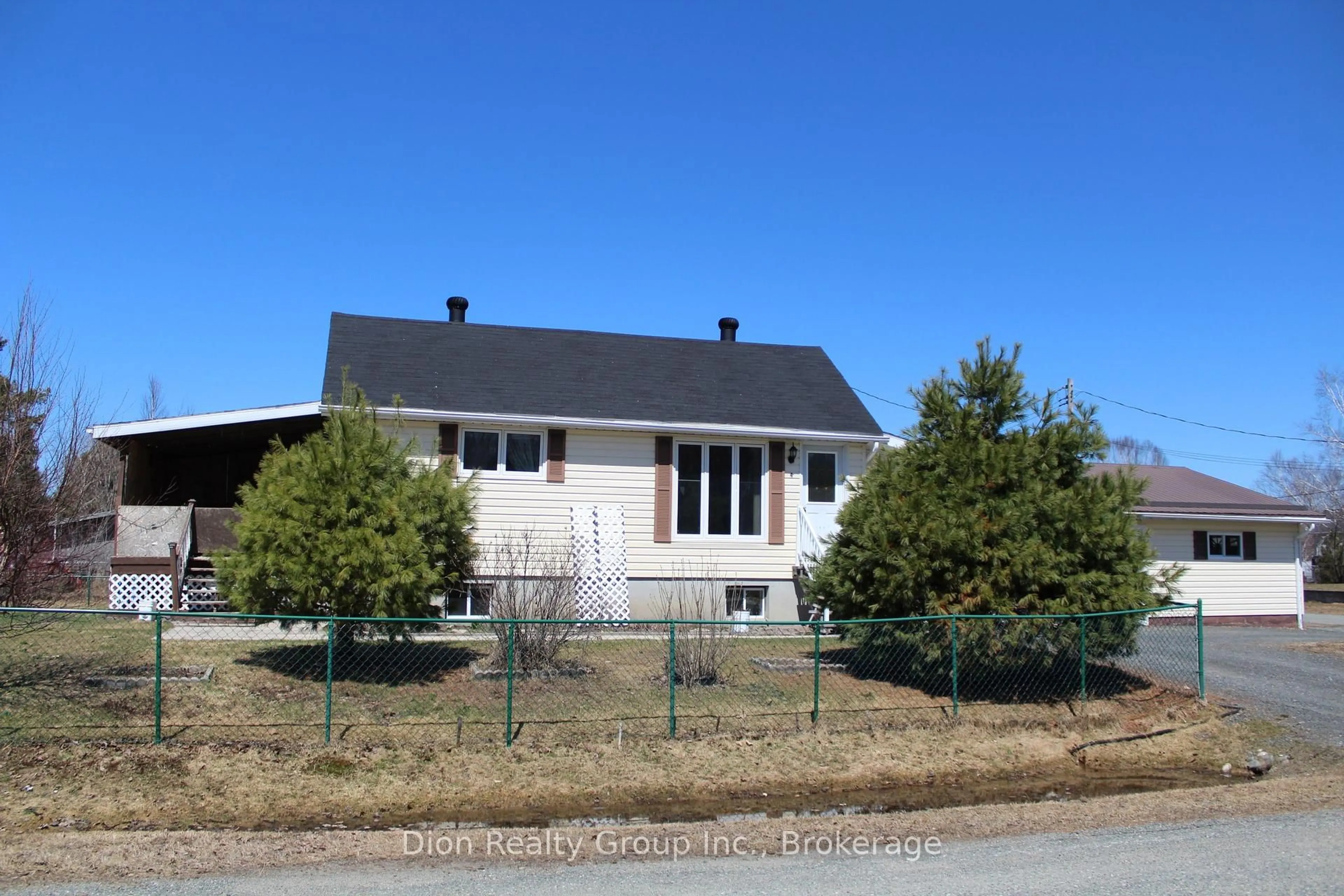 Home with vinyl exterior material, street for 4 Morris Ave, Kirkland Lake Ontario P0K 1K0