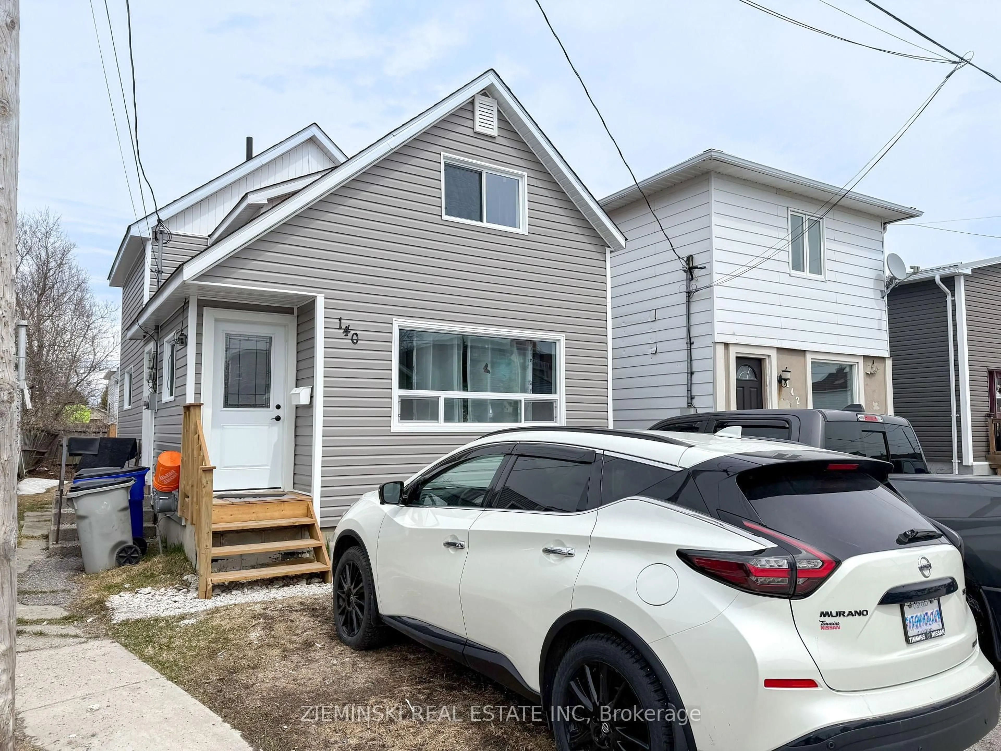 Home with vinyl exterior material, street for 140 Shamrock Ave, Timmins Ontario P0N 1H0