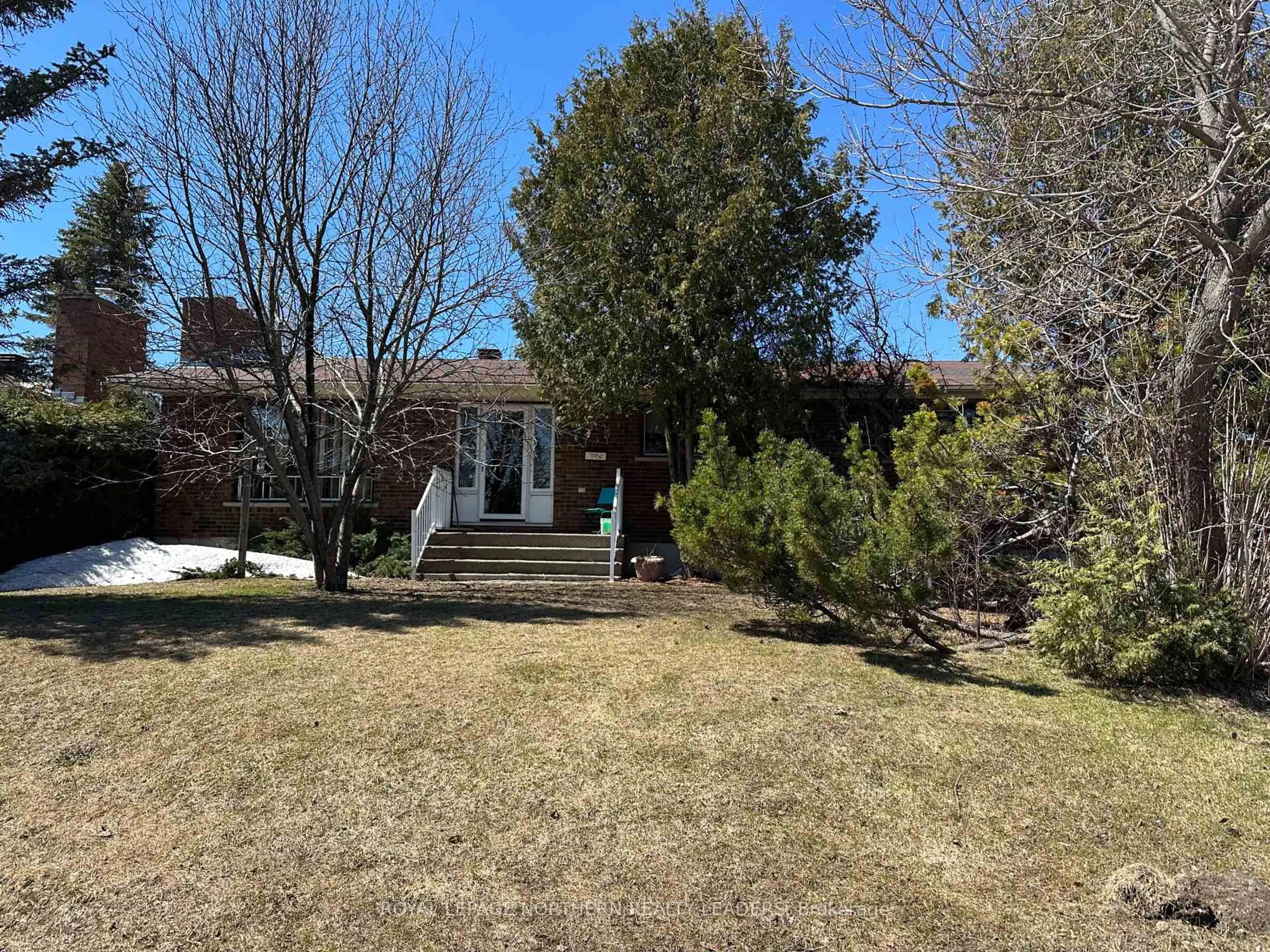 A pic from outside/outdoor area/front of a property/back of a property/a pic from drone, street for 135 Marcel Ave, Timmins Ontario P4R 1H1
