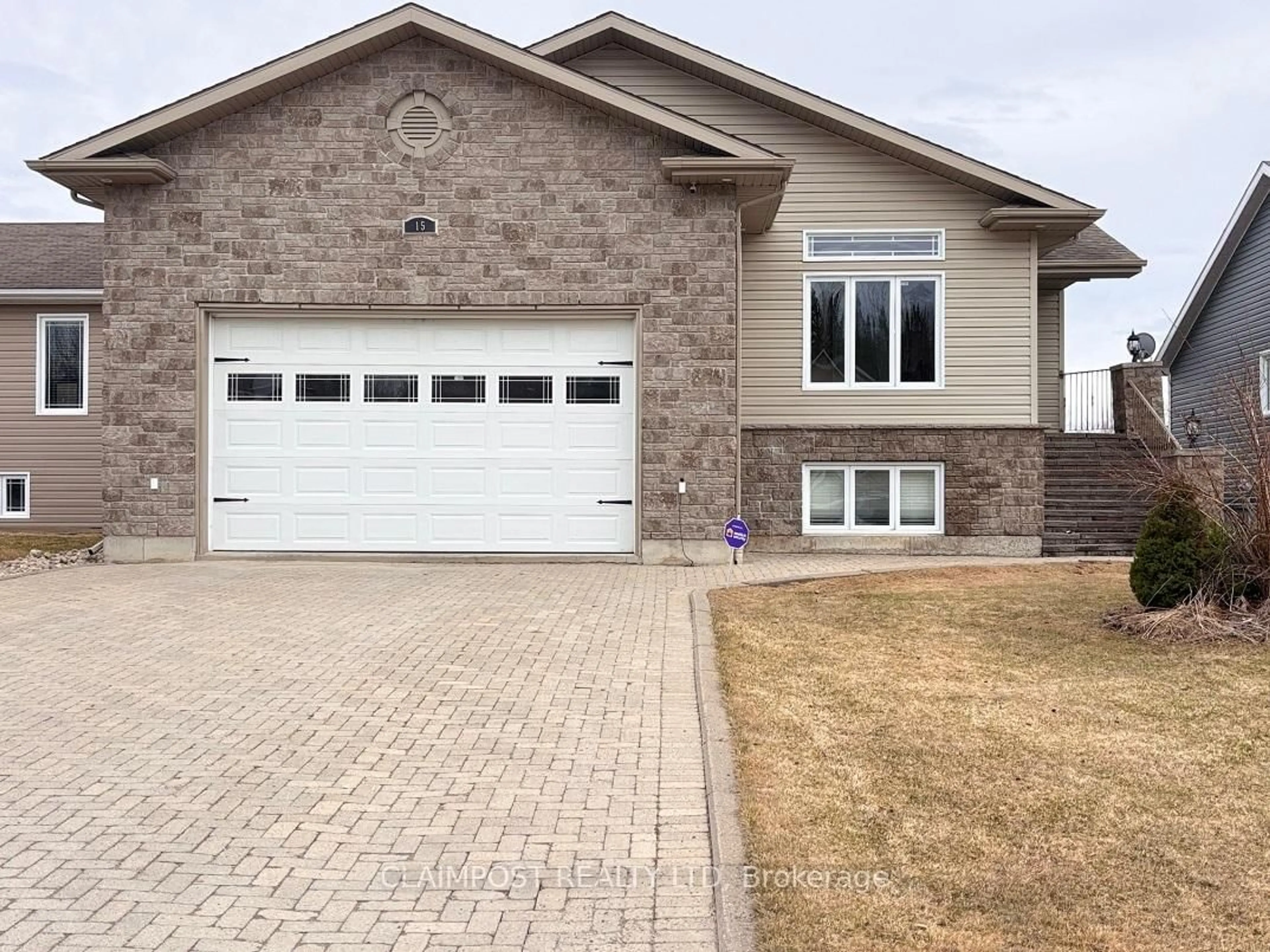 Home with brick exterior material, street for 15 Majestic Dr, Timmins Ontario P4R 1N6