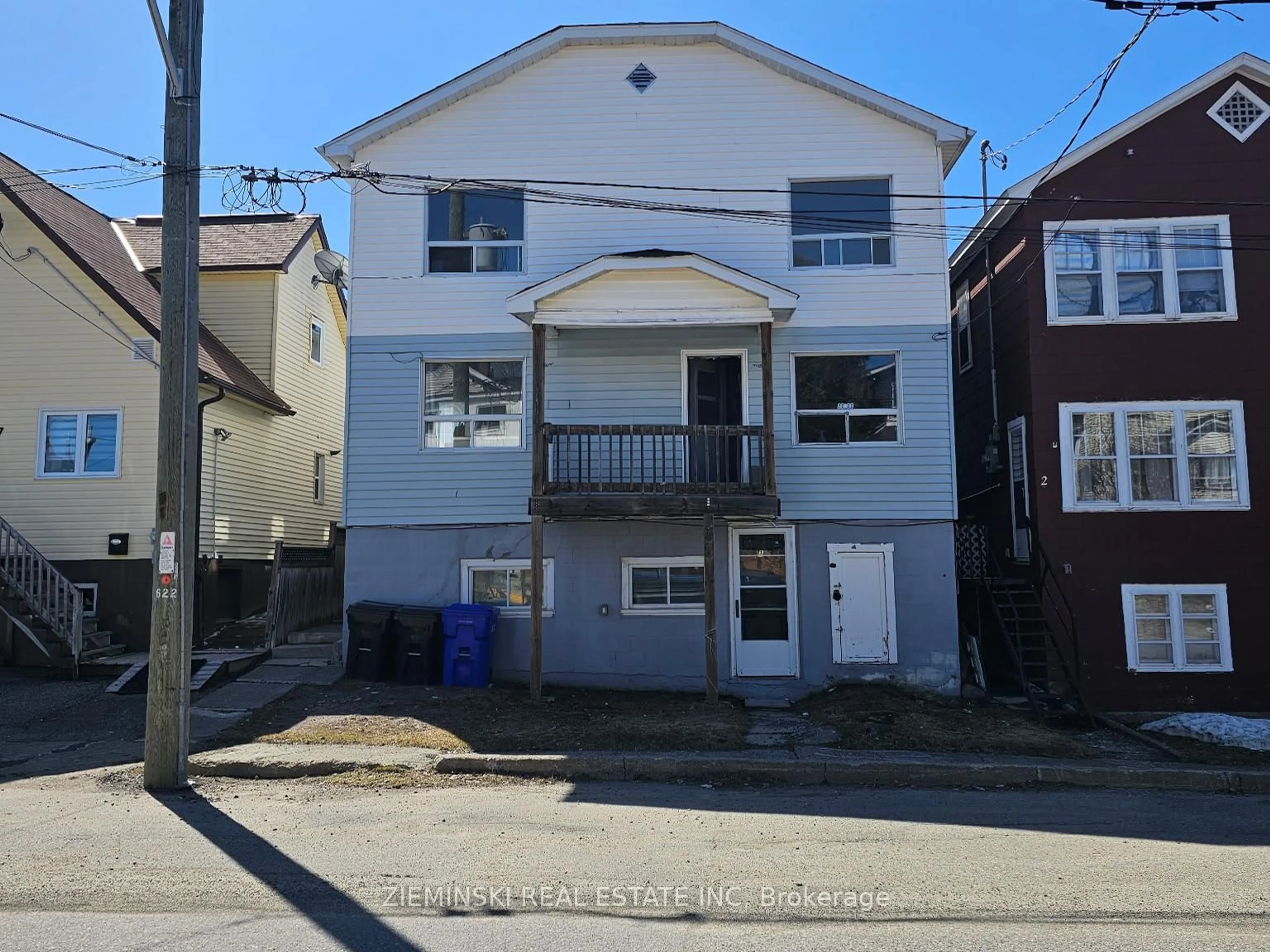 A pic from outside/outdoor area/front of a property/back of a property/a pic from drone, street for 35 Woods St, Kirkland Lake Ontario P2N 3B7