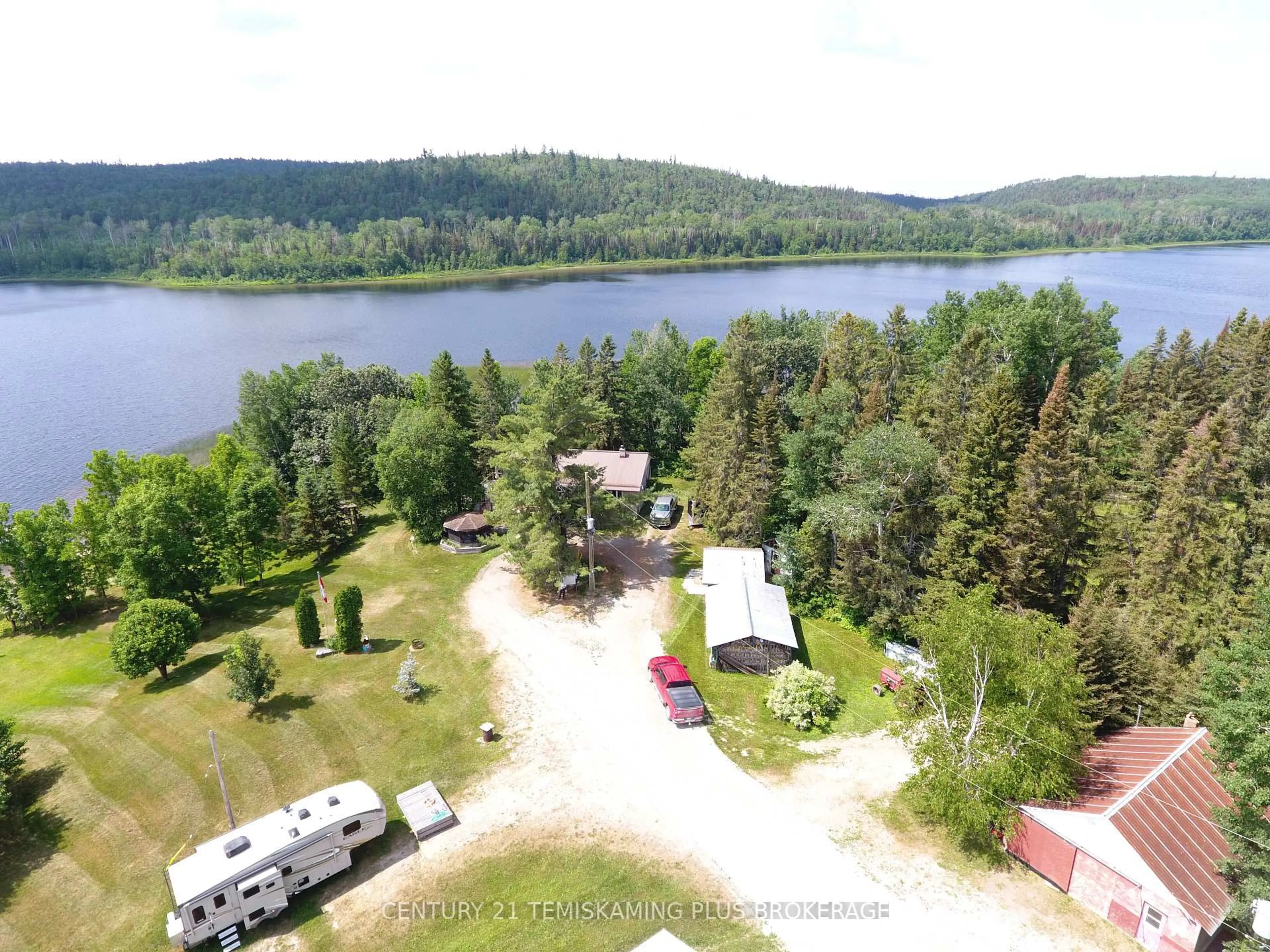 A pic from outside/outdoor area/front of a property/back of a property/a pic from drone, water/lake/river/ocean view for 452 Highway 65 N/A, James Ontario P0J 1G0