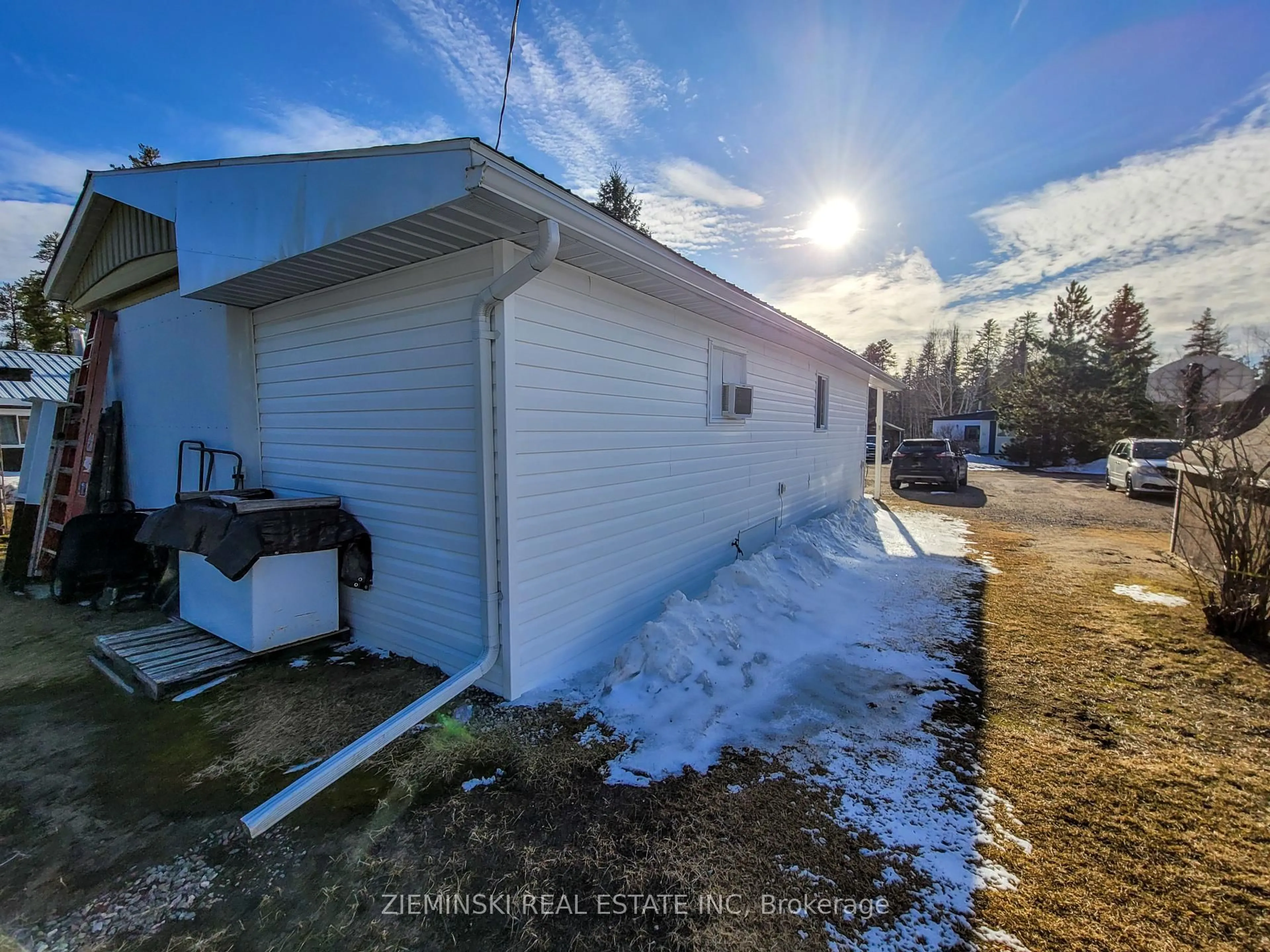 A pic from outside/outdoor area/front of a property/back of a property/a pic from drone, unknown for 15-8885 Hwy 11 Highway, Iroquois Falls Ontario P0K 1G0