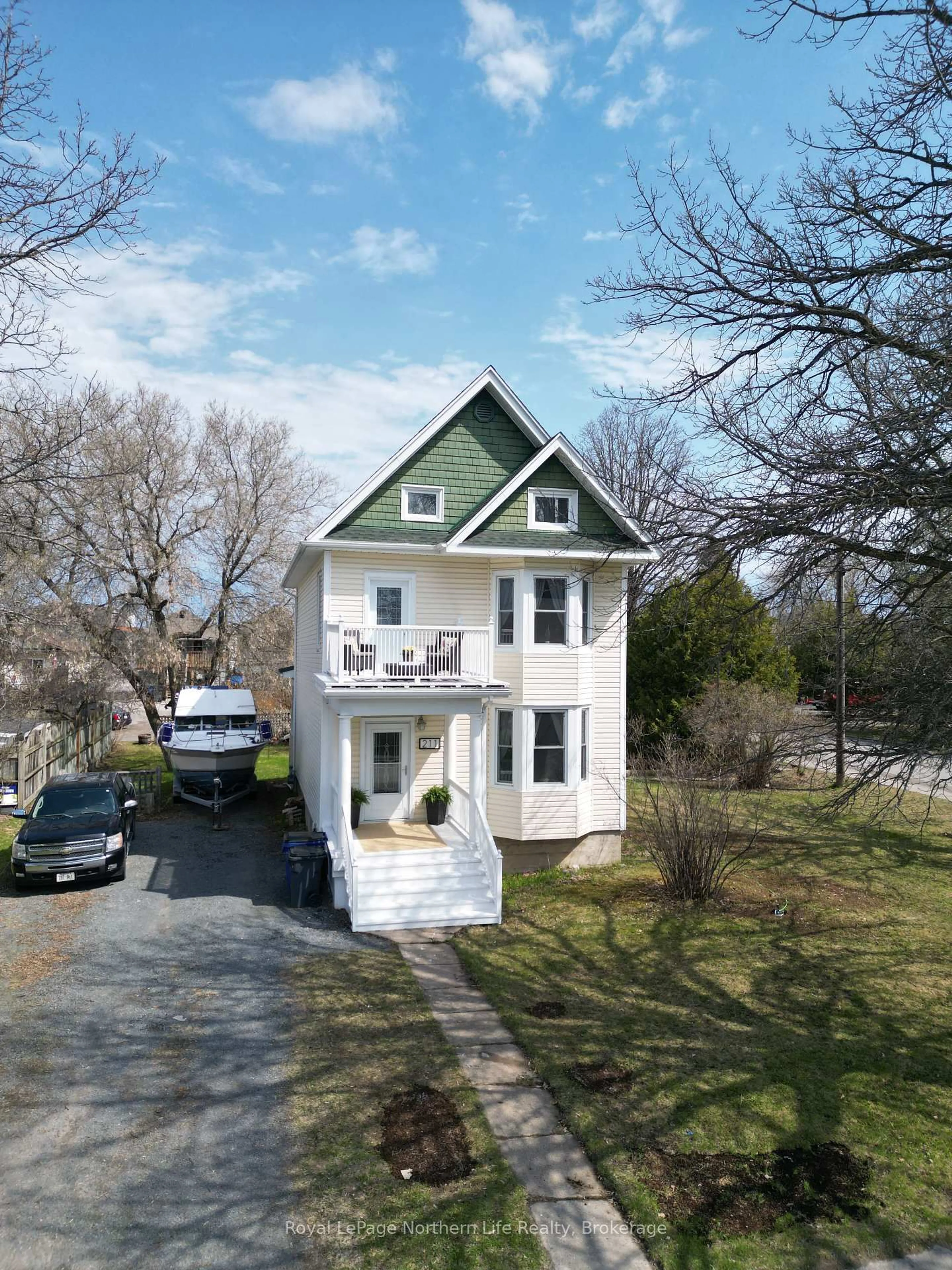 A pic from outside/outdoor area/front of a property/back of a property/a pic from drone, street for 211 Farah Ave, Temiskaming Shores Ontario P0J 1P0