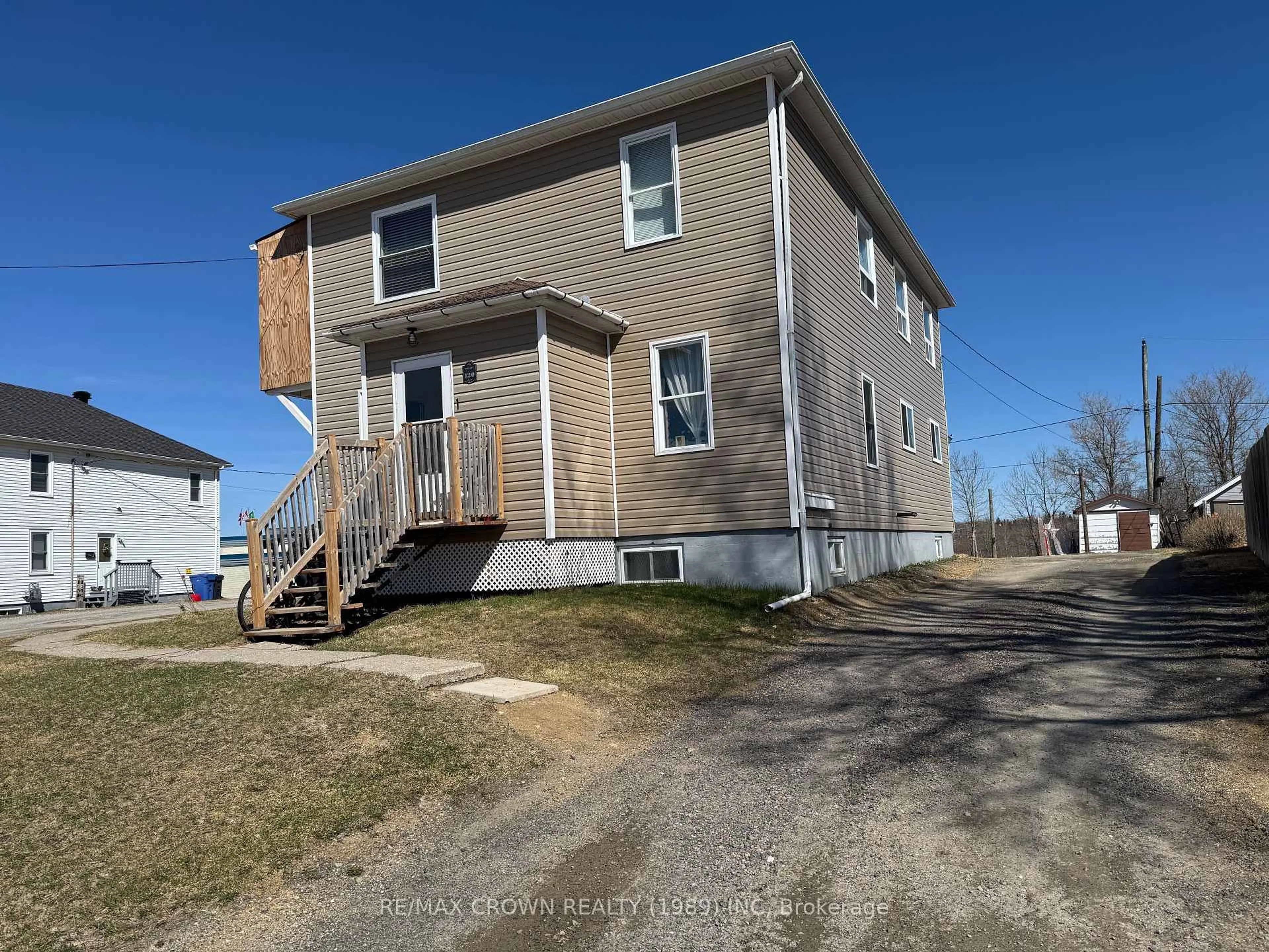 A pic from outside/outdoor area/front of a property/back of a property/a pic from drone, building for 120 Byng Ave, Kapuskasing Ontario P5N 1X2