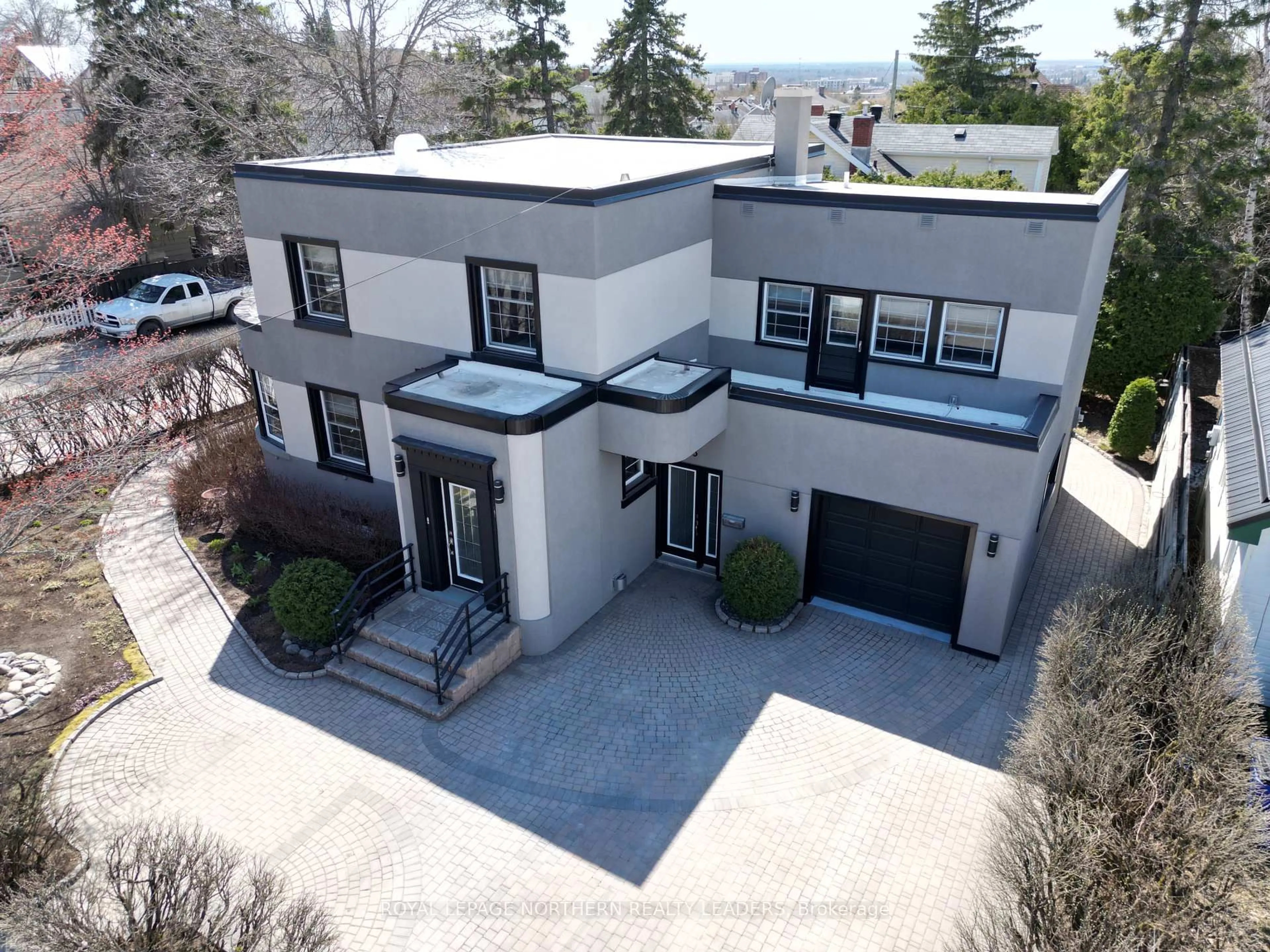 A pic from outside/outdoor area/front of a property/back of a property/a pic from drone, street for 205 Cherry St, Timmins Ontario P4N 6W3