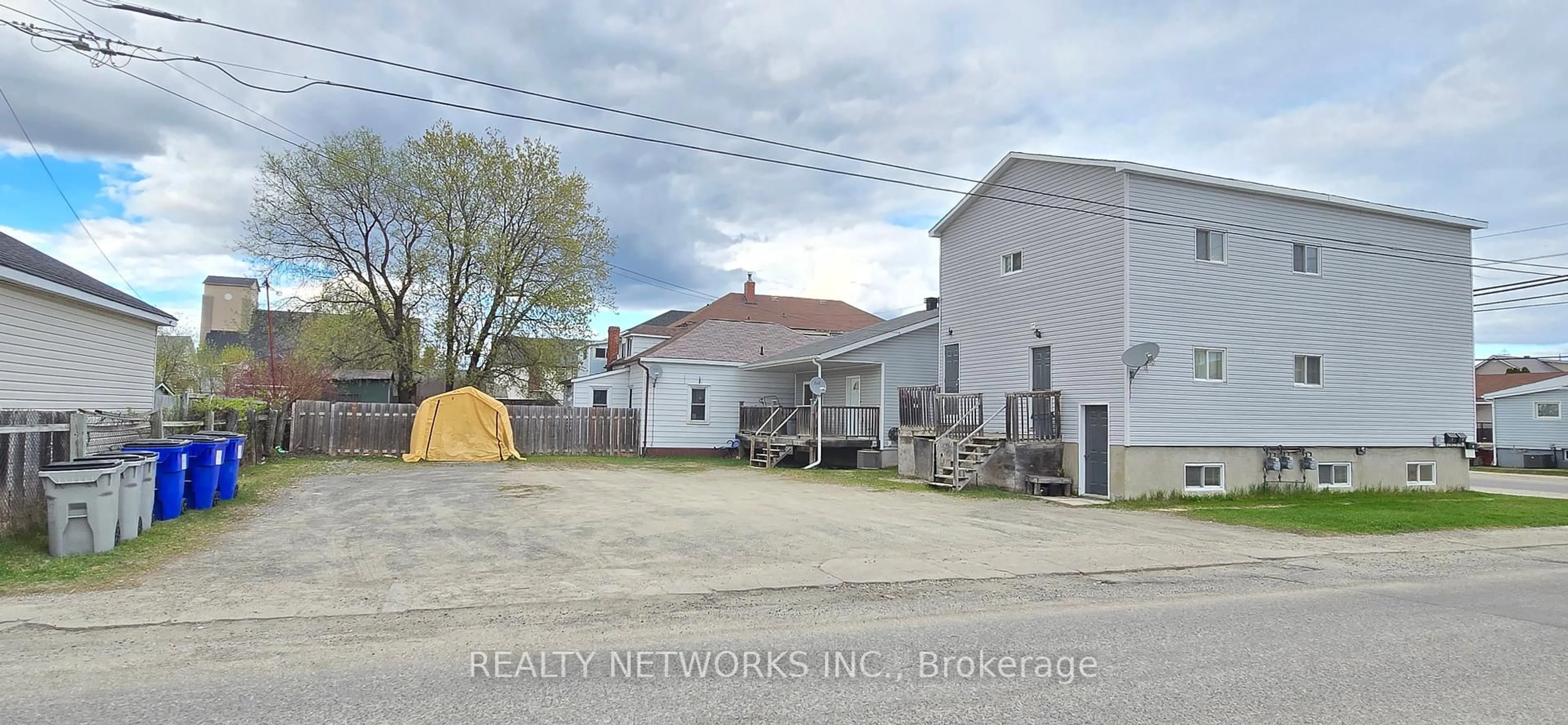 A pic from outside/outdoor area/front of a property/back of a property/a pic from drone, street for 355-359 Pine st south St, Timmins Ontario P4N 2L1