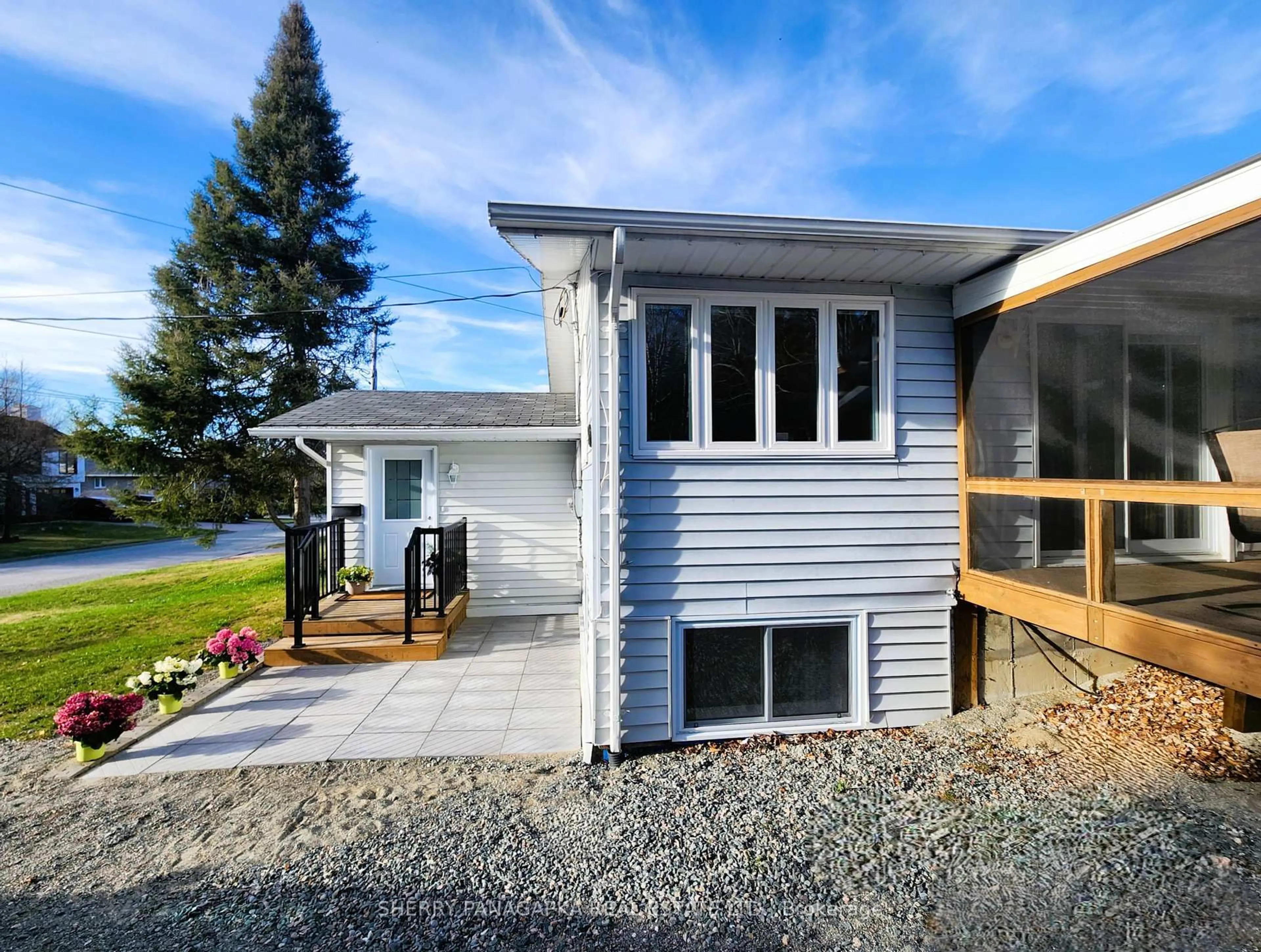 Home with vinyl exterior material, street for 71 Balsam Ave, Kirkland Lake Ontario P2N 1W7