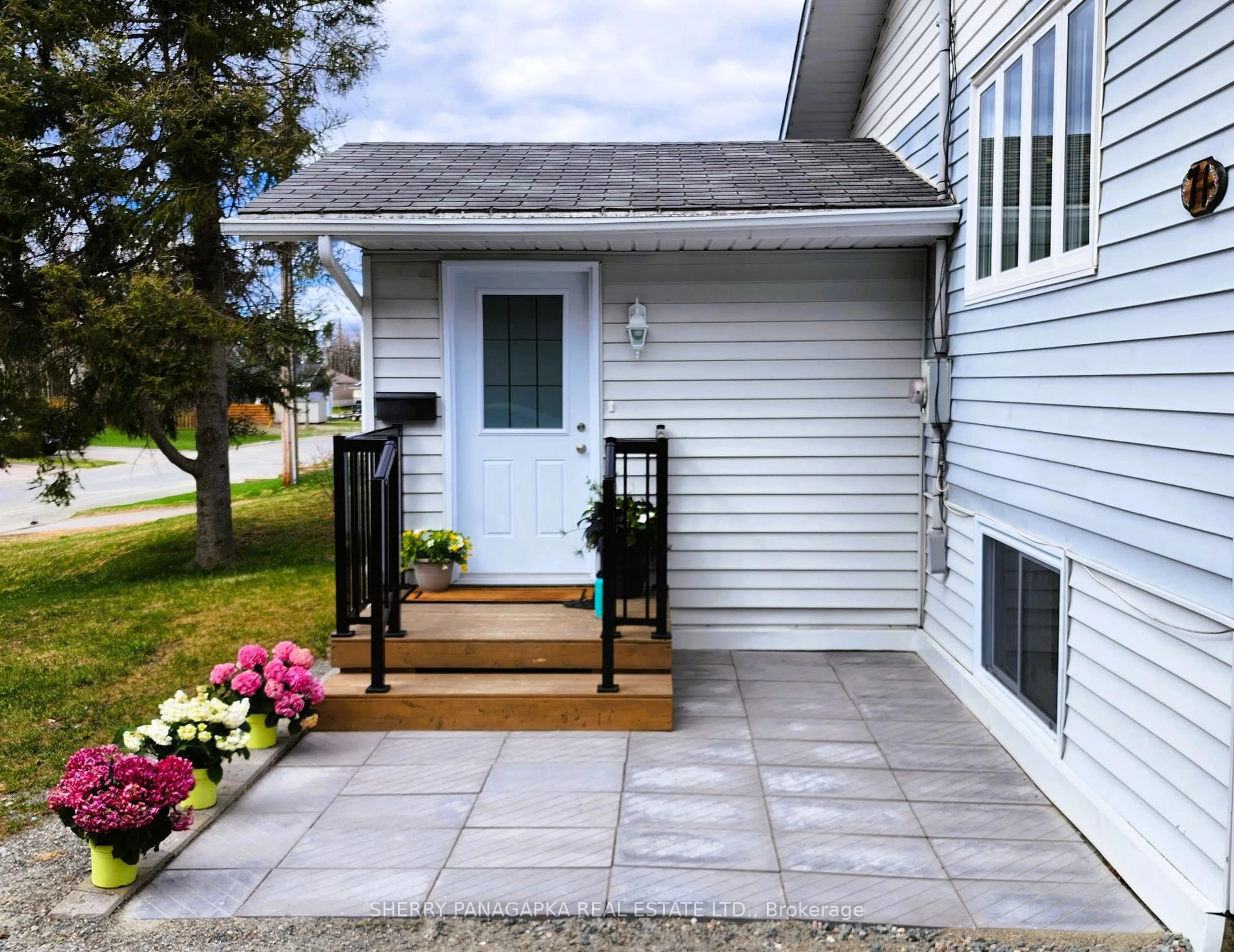 Home with vinyl exterior material, street for 71 Balsam Ave, Kirkland Lake Ontario P2N 1W7
