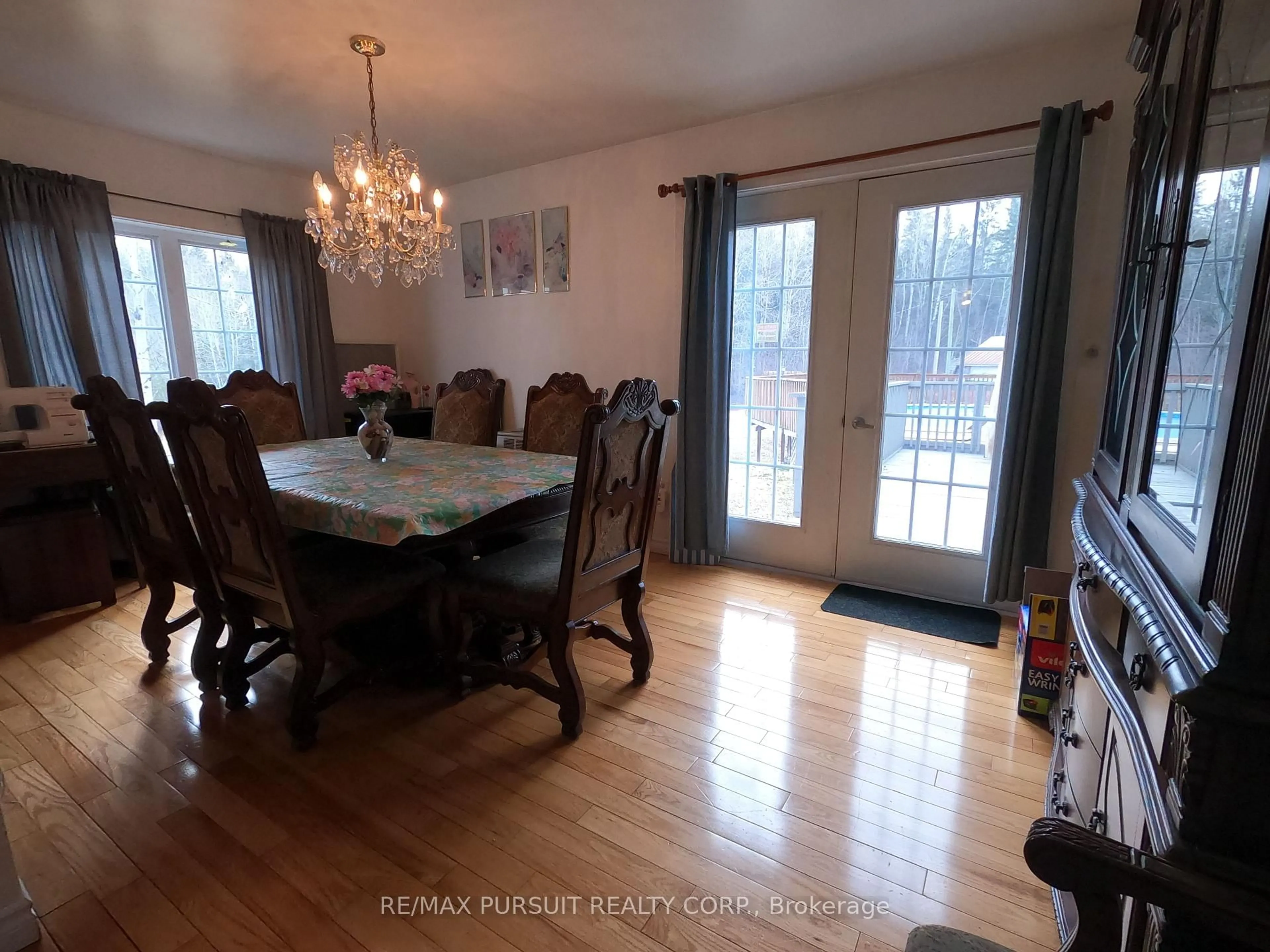 Dining room, wood/laminate floor for 8 Townsley Ave, Timiskaming Ontario P0K 1X0