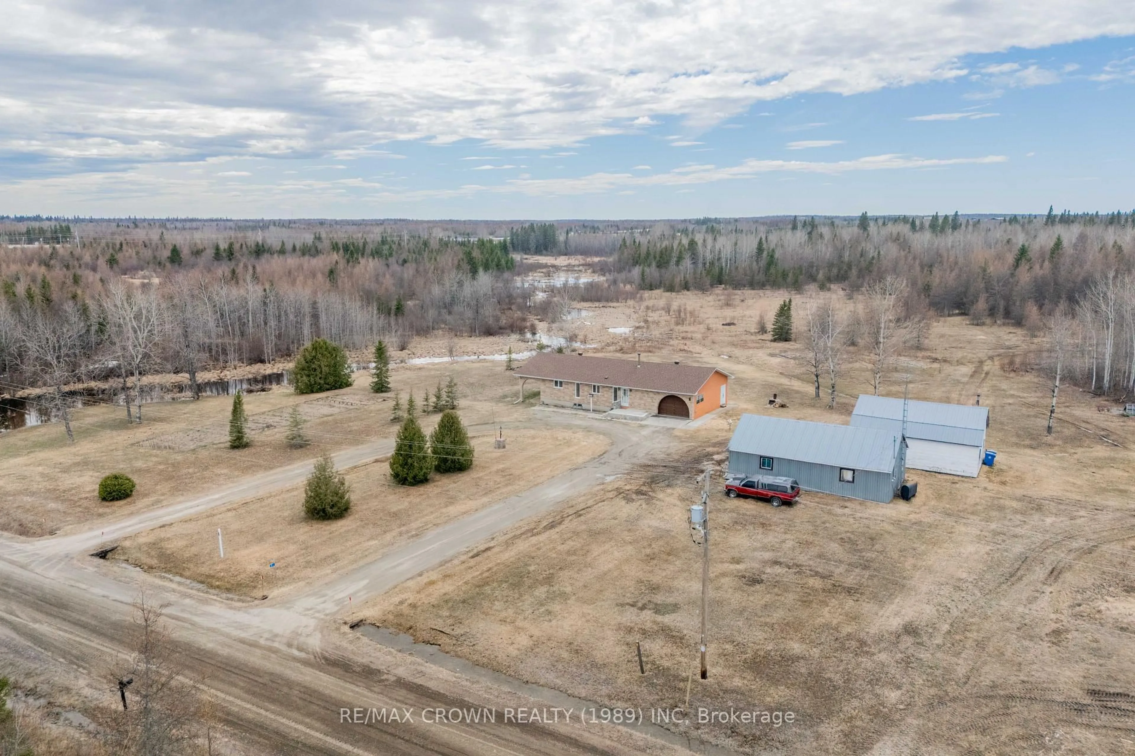 A pic from outside/outdoor area/front of a property/back of a property/a pic from drone, unknown for 3 Nursery Rd, Moonbeam Ontario P0L 1V0